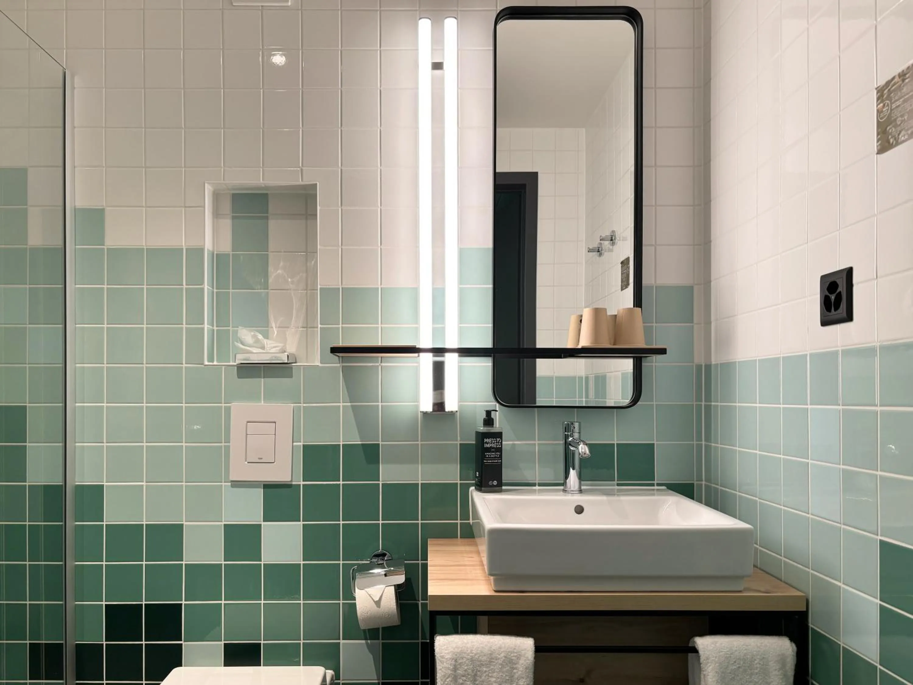 Bathroom in Nonanteneuf Appart-hôtel Sierre - Self Check-in