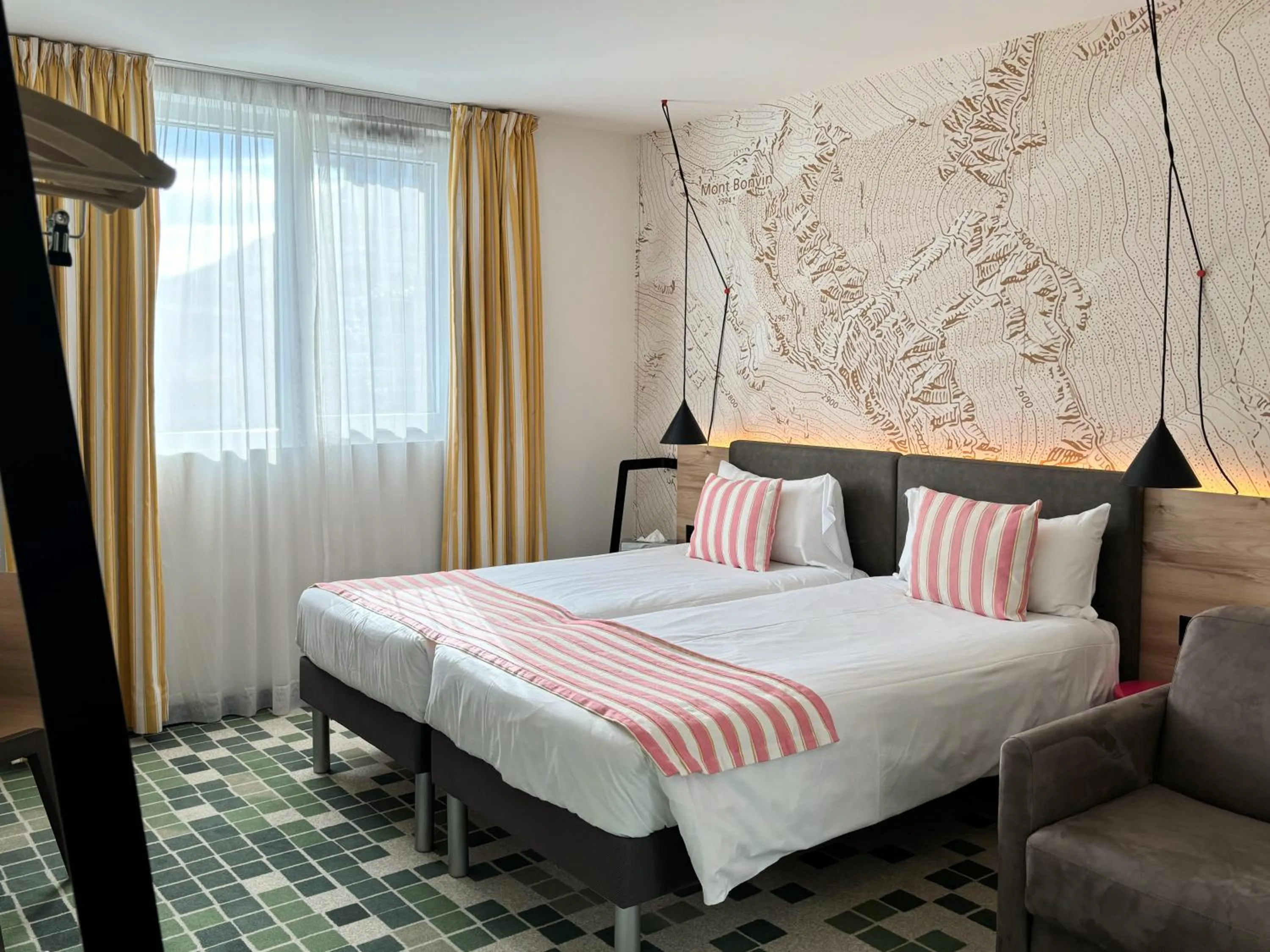 Bed in Nonanteneuf Appart-hôtel Sierre - Self Check-in