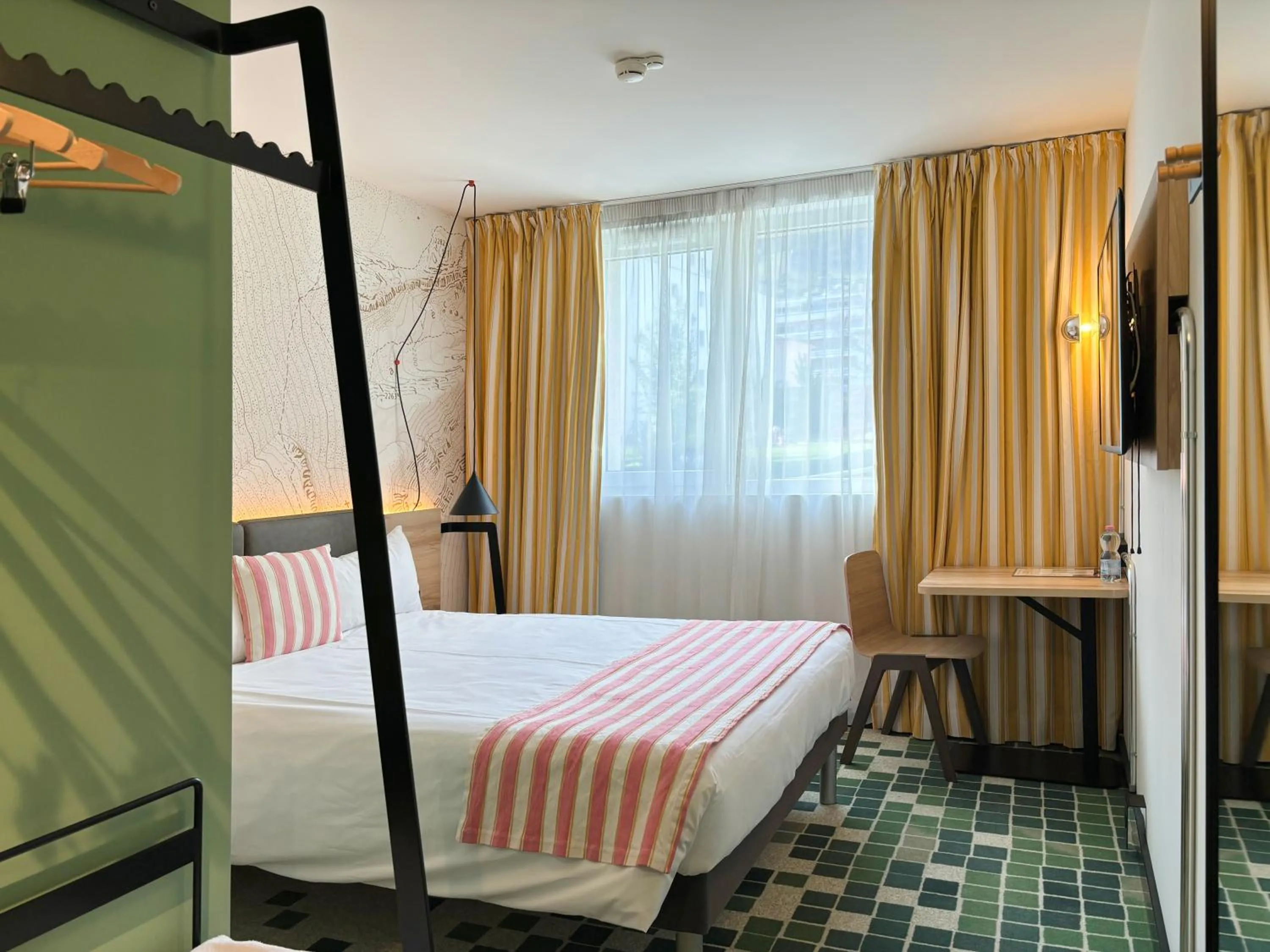 Bed in Nonanteneuf Appart-hôtel Sierre - Self Check-in