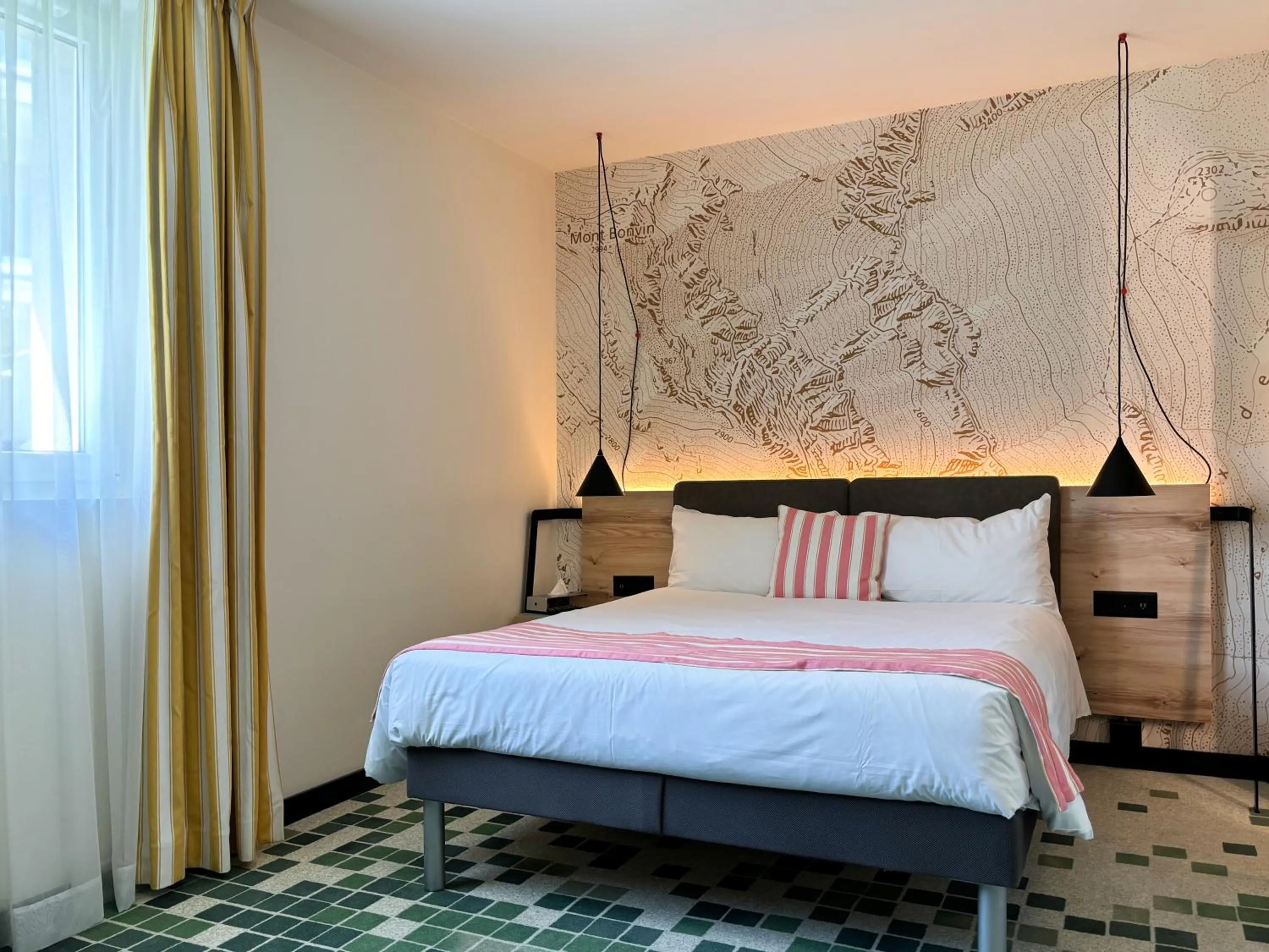 Bed in Nonanteneuf Appart-hôtel Sierre - Self Check-in