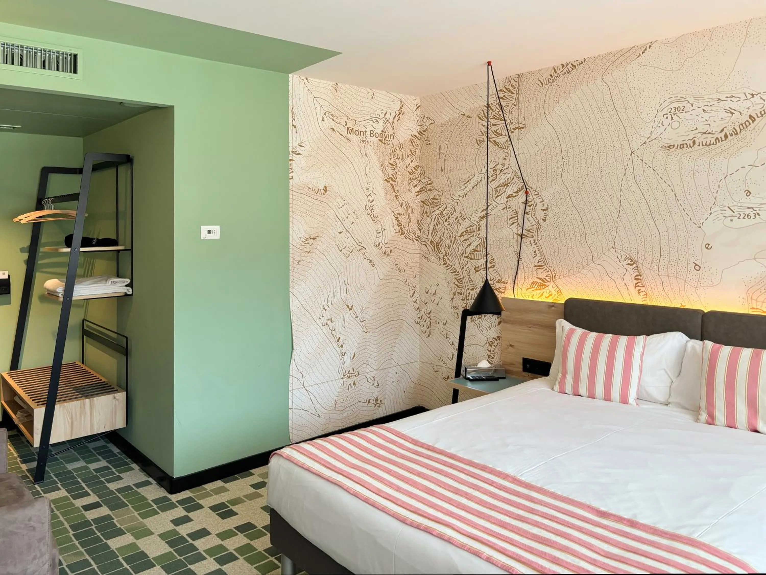 Bed in Nonanteneuf Appart-hôtel Sierre - Self Check-in