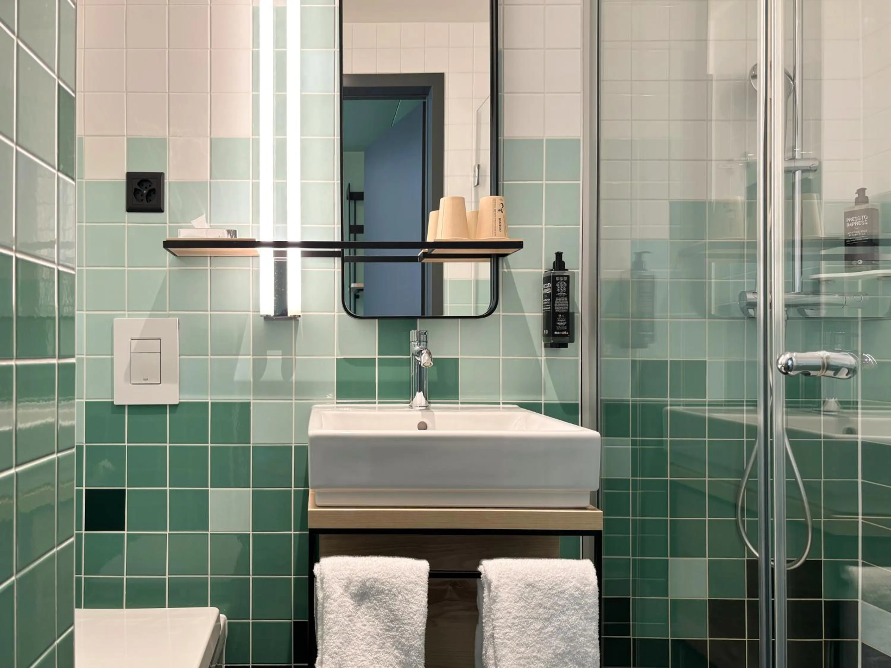 Bathroom in Nonanteneuf Appart-hôtel Sierre - Self Check-in