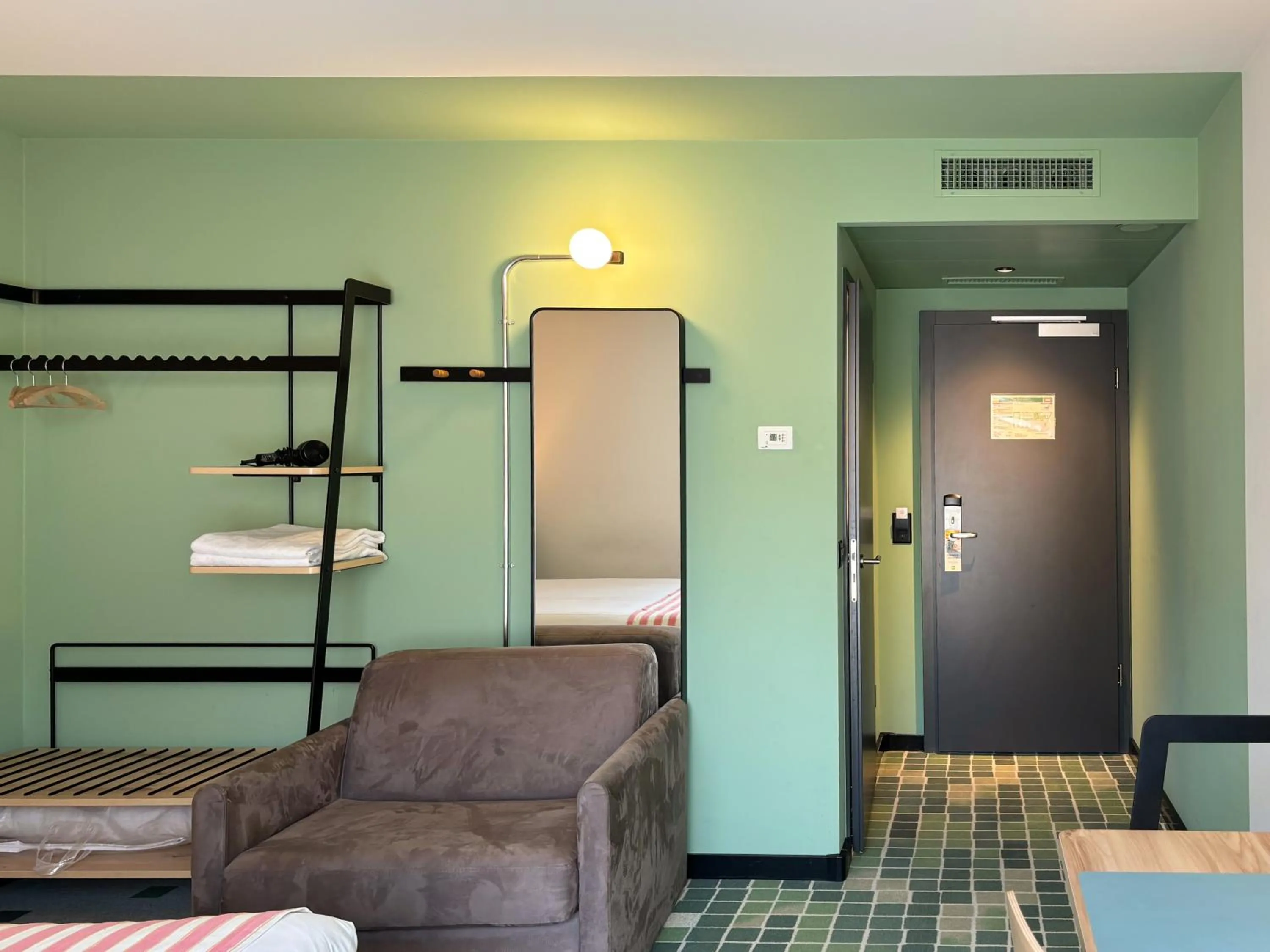 Bedroom in Nonanteneuf Appart-hôtel Sierre - Self Check-in