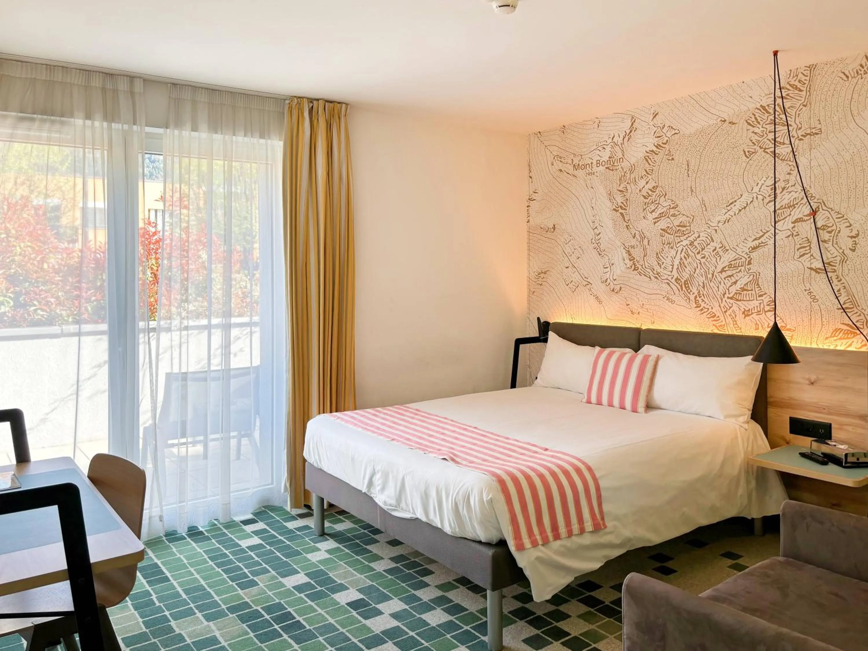 Bed in Nonanteneuf Appart-hôtel Sierre - Self Check-in