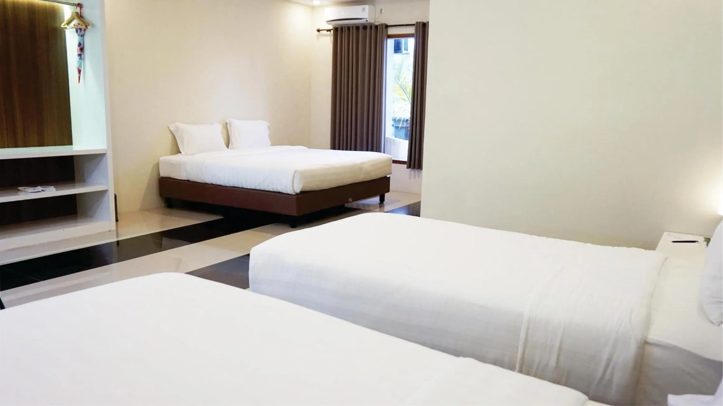Bed in Grand Harvest Resort & Villas