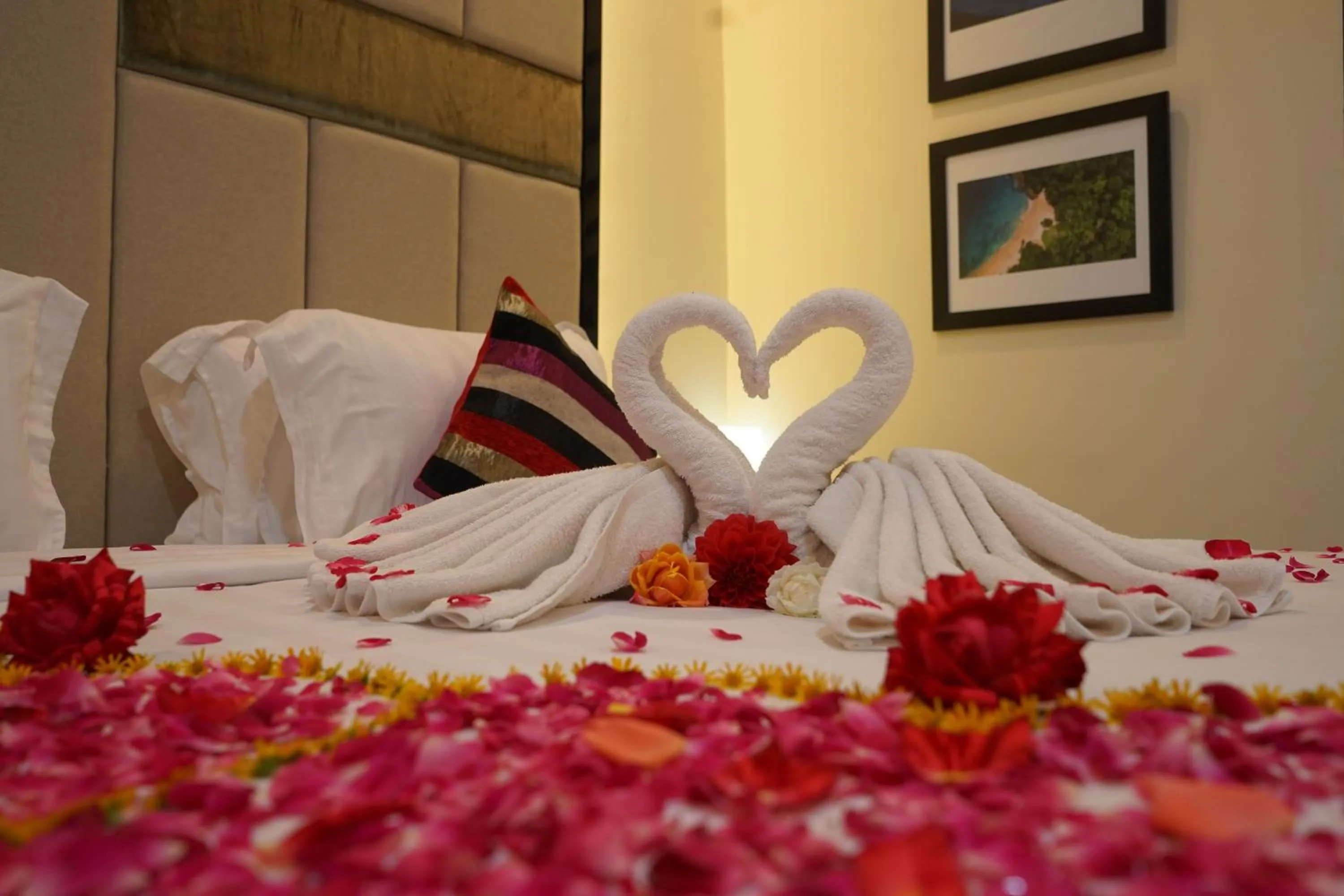 Bed in Grand Harvest Resort & Villas