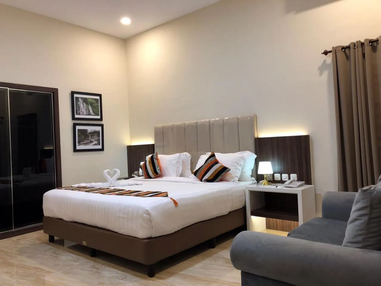 Bed in Grand Harvest Resort & Villas