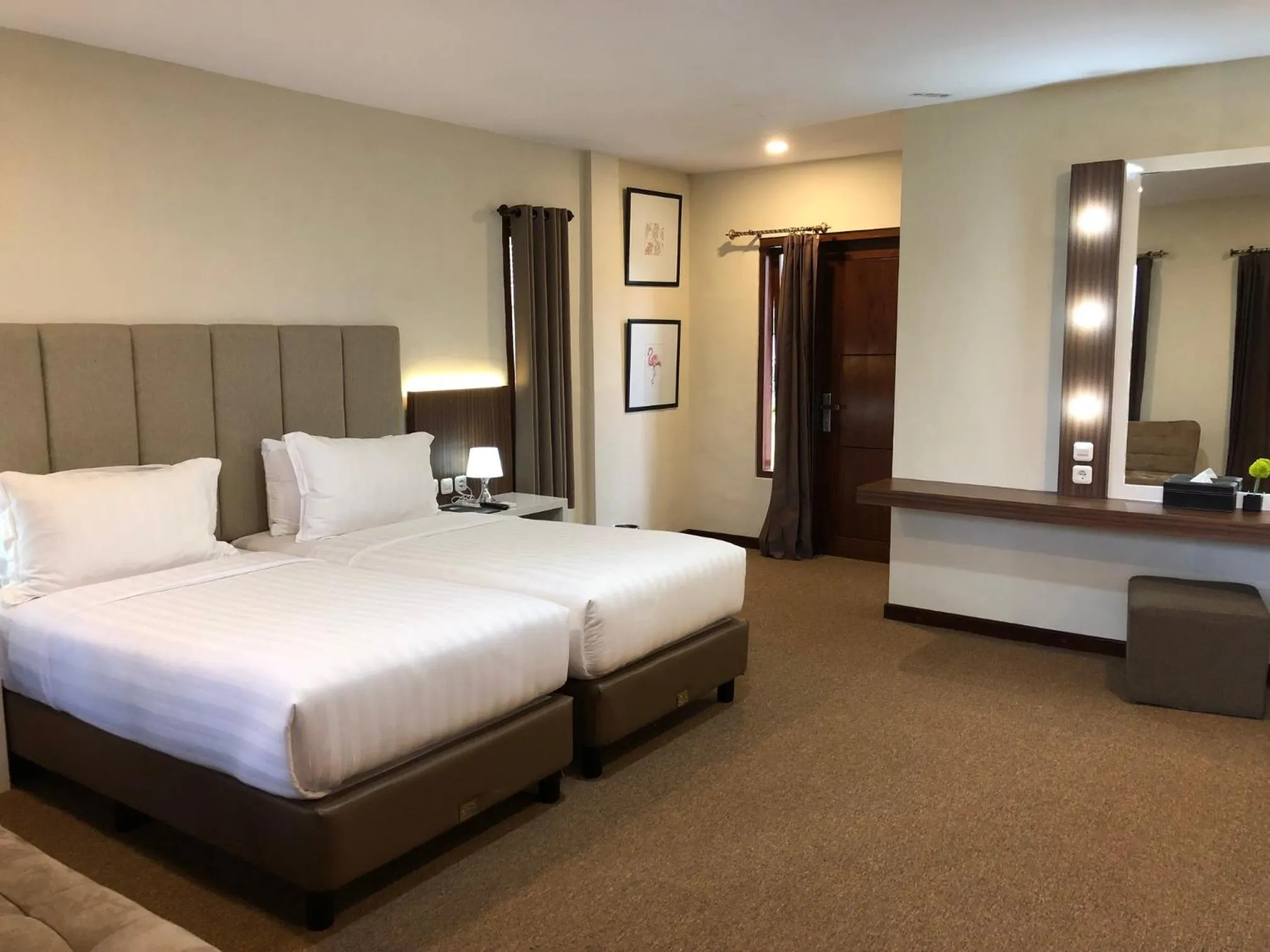 Bed in Grand Harvest Resort & Villas