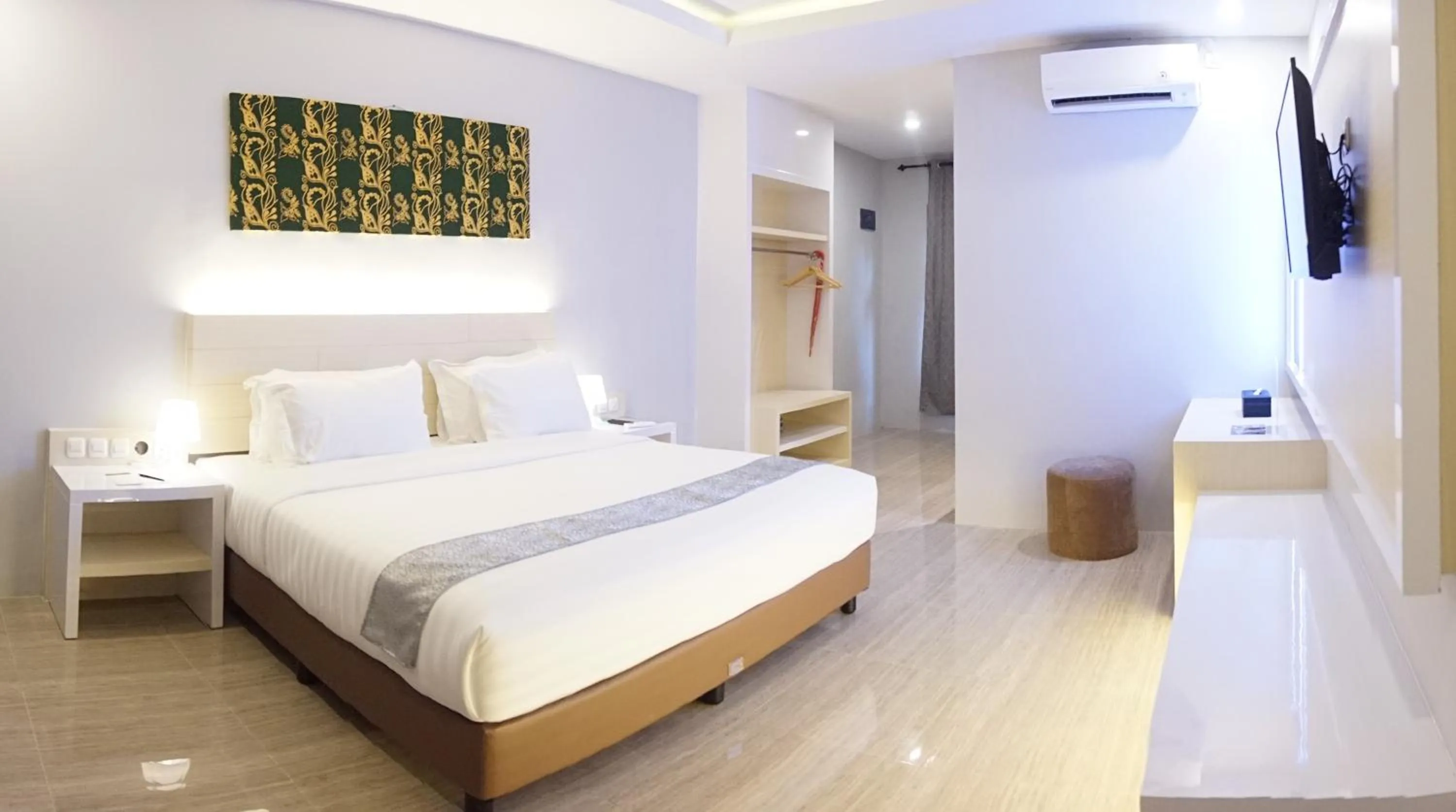 Bed in Grand Harvest Resort & Villas