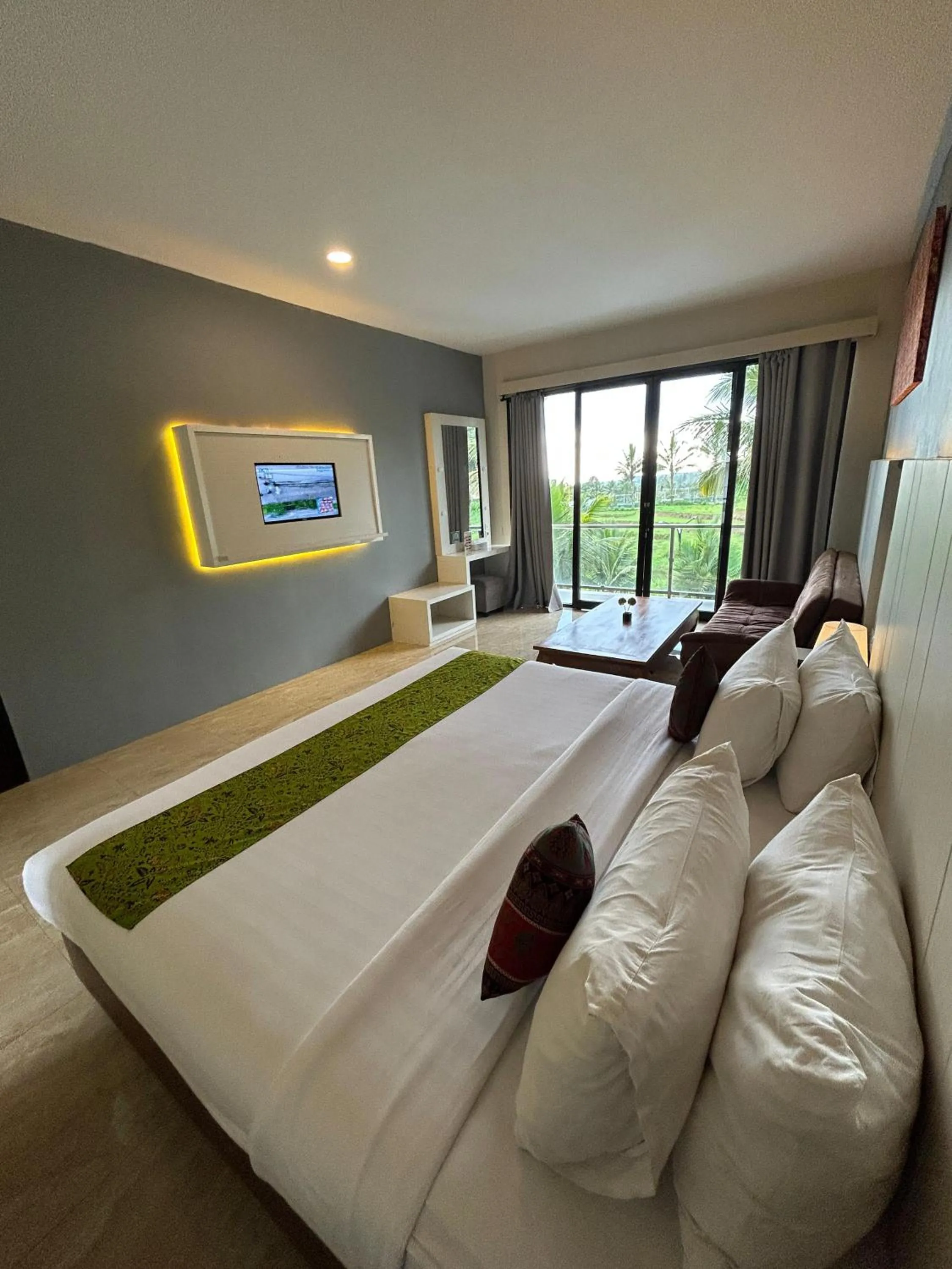 Bed in Grand Harvest Resort & Villas