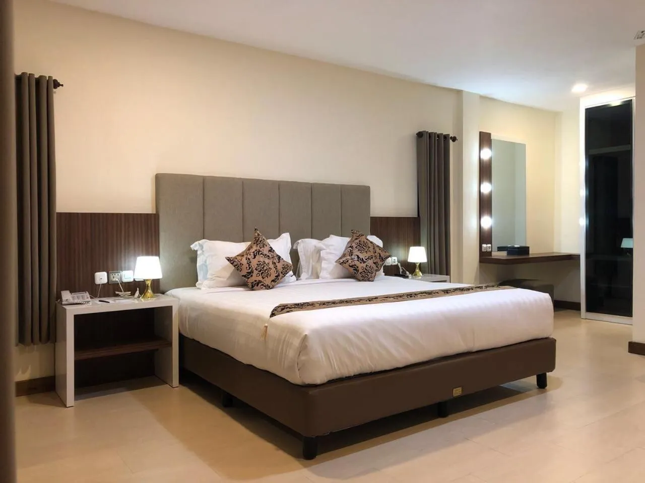 Bed in Grand Harvest Resort & Villas