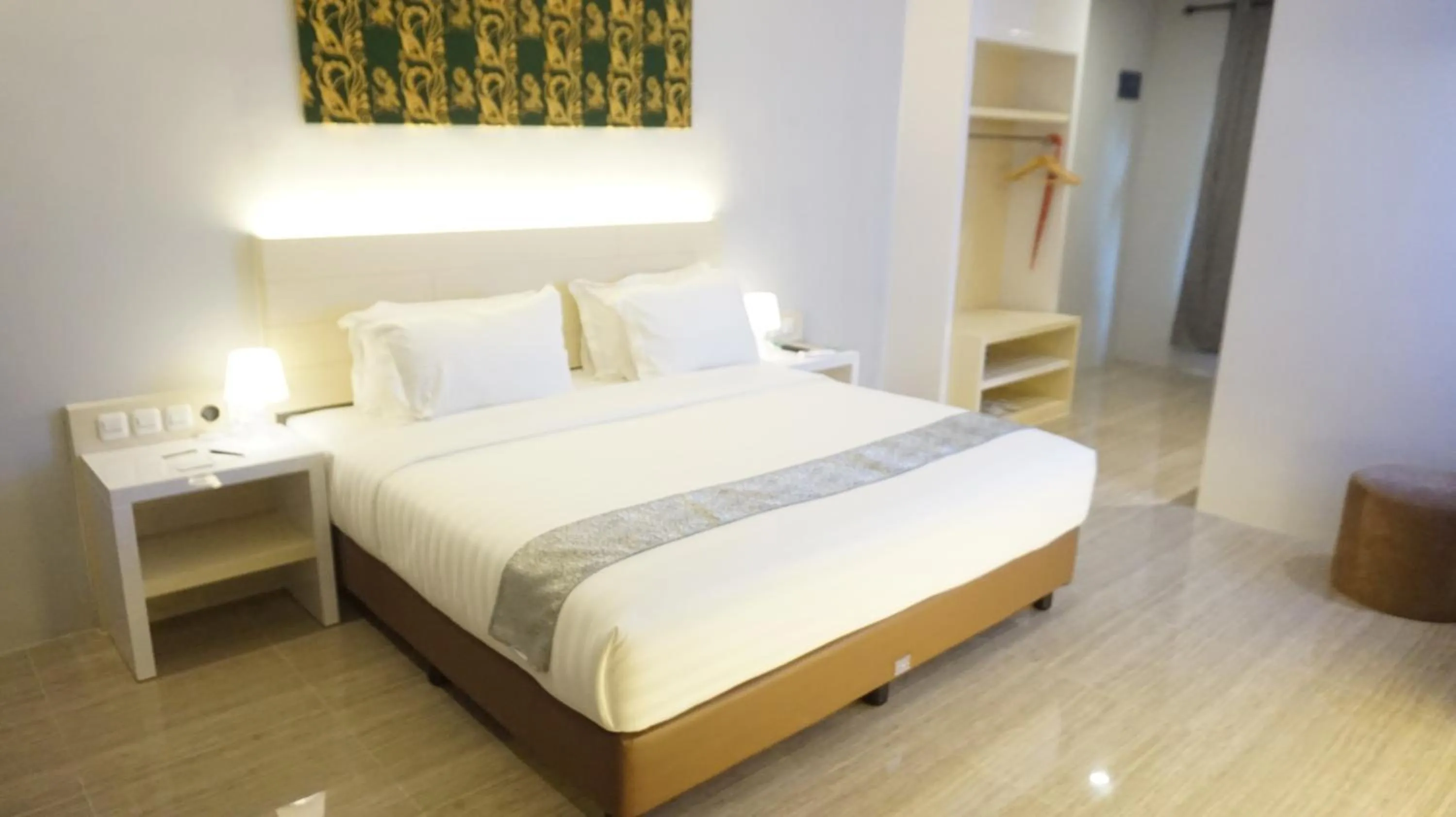 Bed in Grand Harvest Resort & Villas