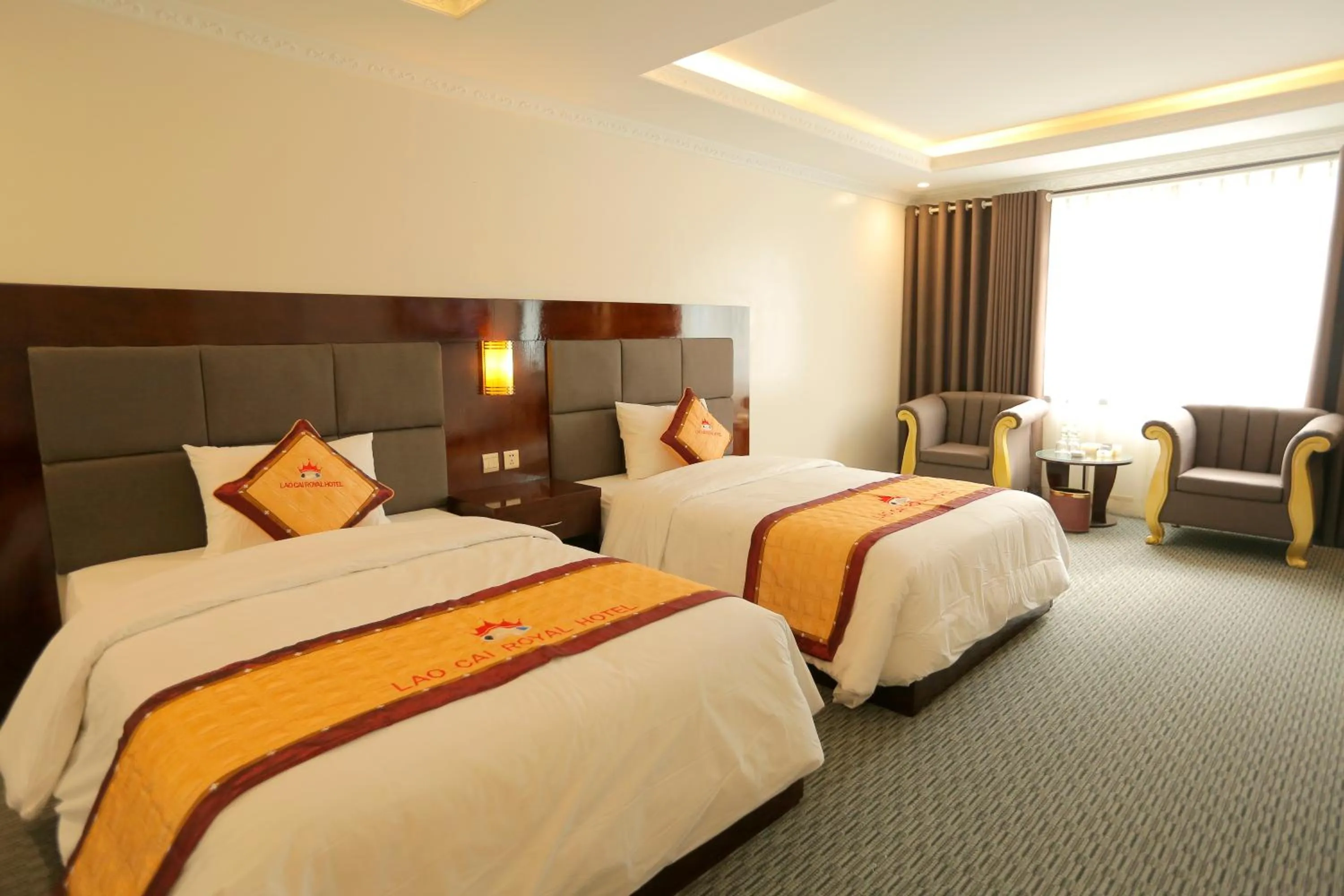 Photo of the whole room, Bed in Lao Cai Royal Hotel