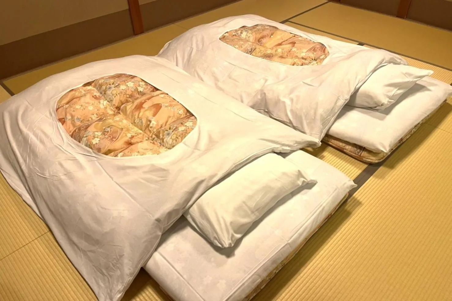 Photo of the whole room, Bed in TAKITEI Riverside Onsen ーA Hidden Ryokan in Kanazawaー