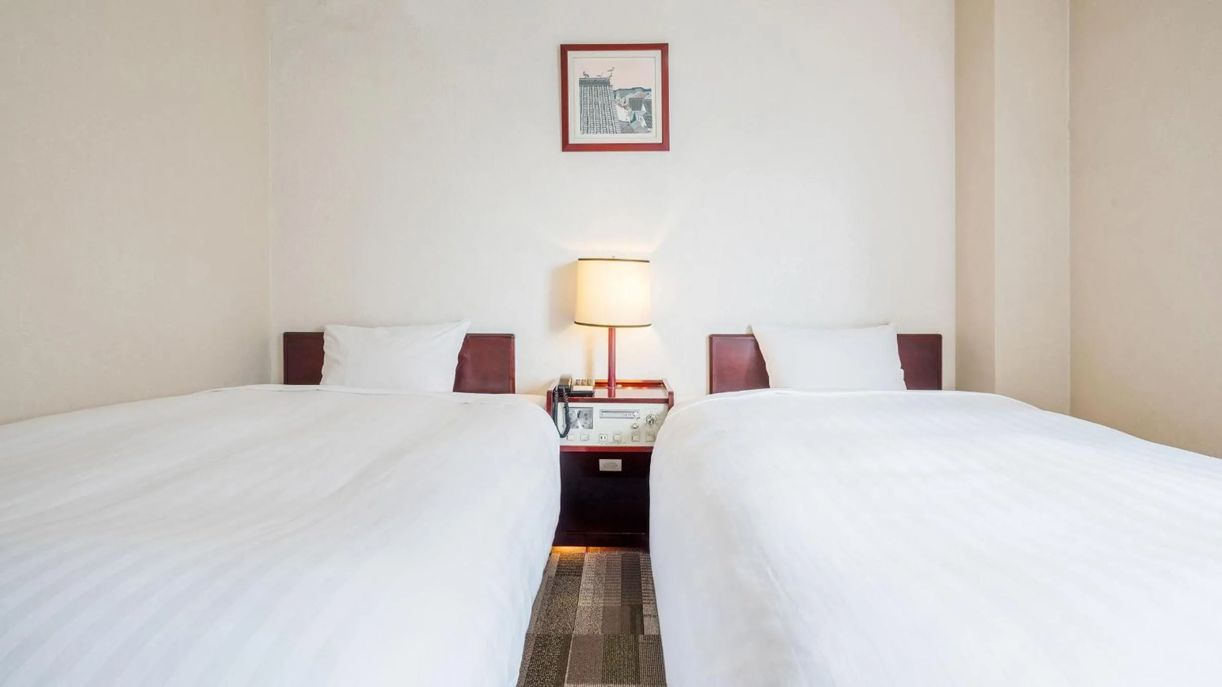 Bed in Hotel Paco Obihiro Chuo