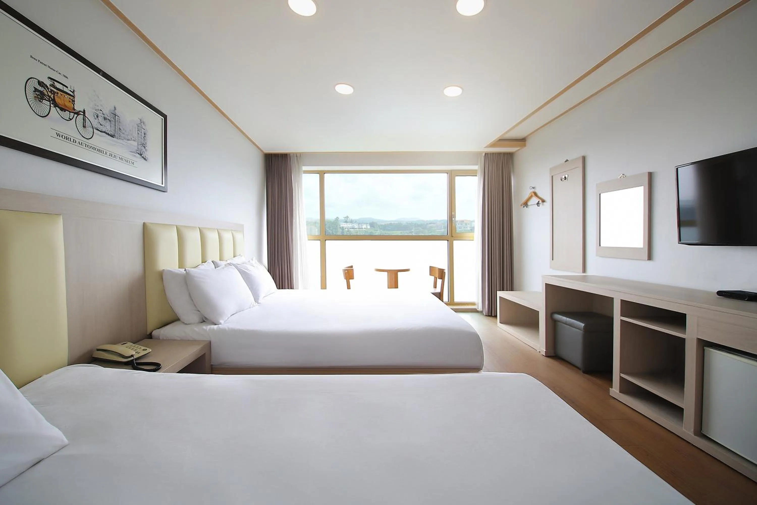 Bed in Shin Shin Hotel Jeju City