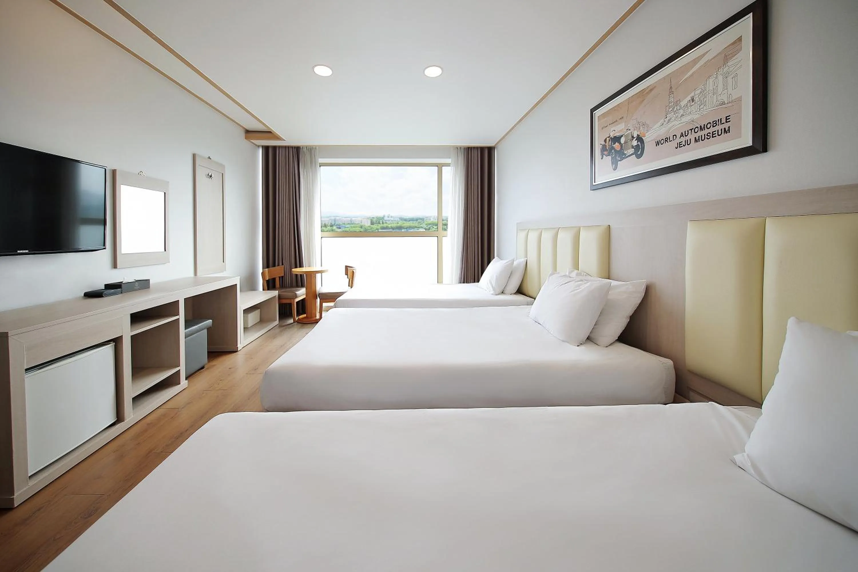 Bed in Shin Shin Hotel Jeju City