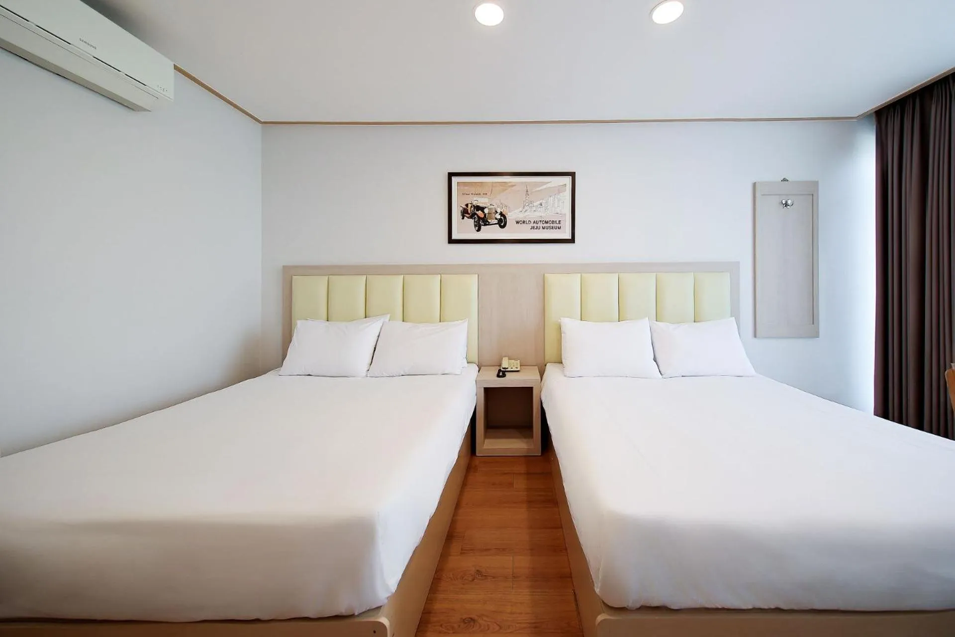Bed in Shin Shin Hotel Jeju City
