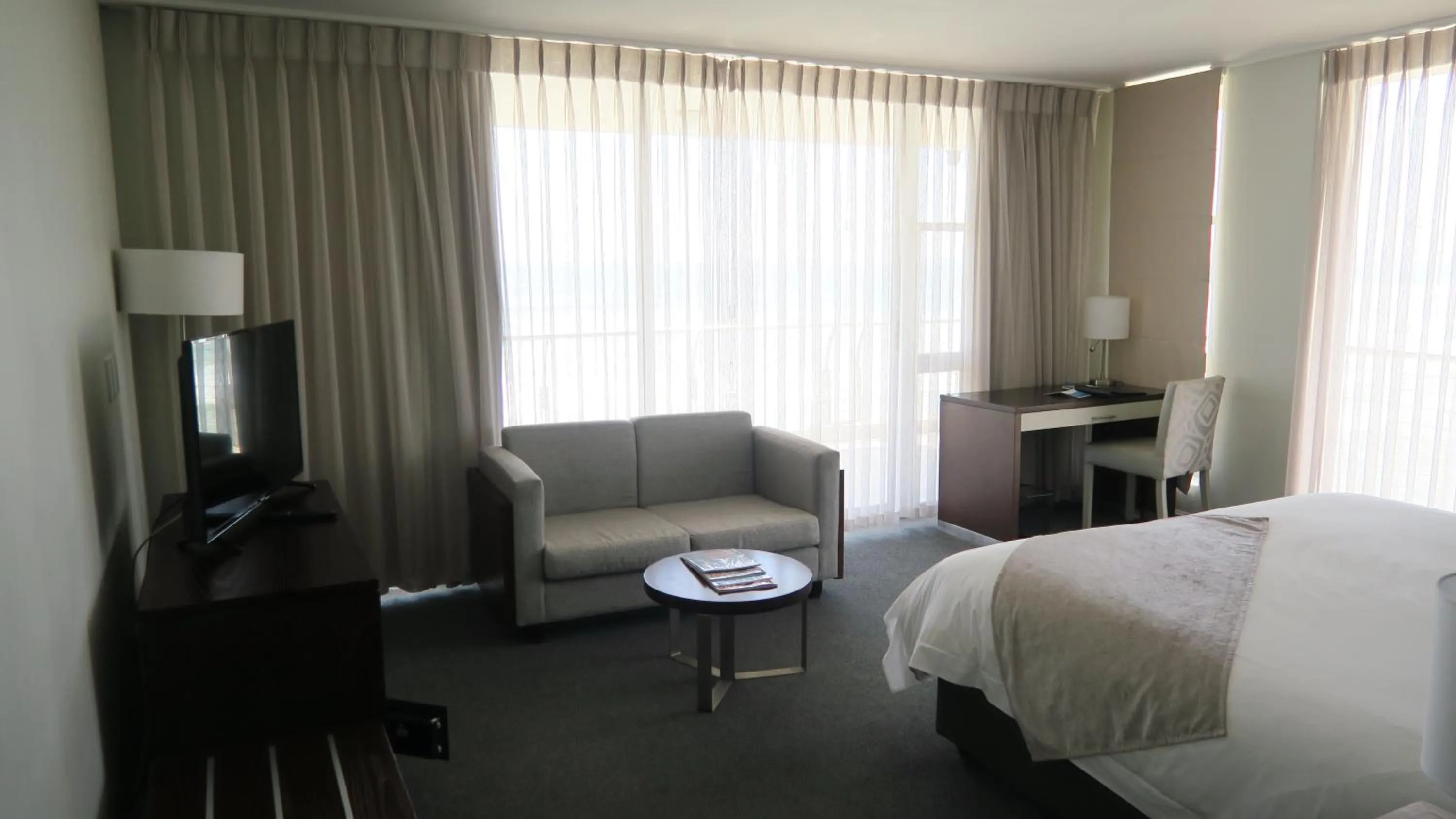 Seating area, Bed in Lagoon Beach Hotel Apartments