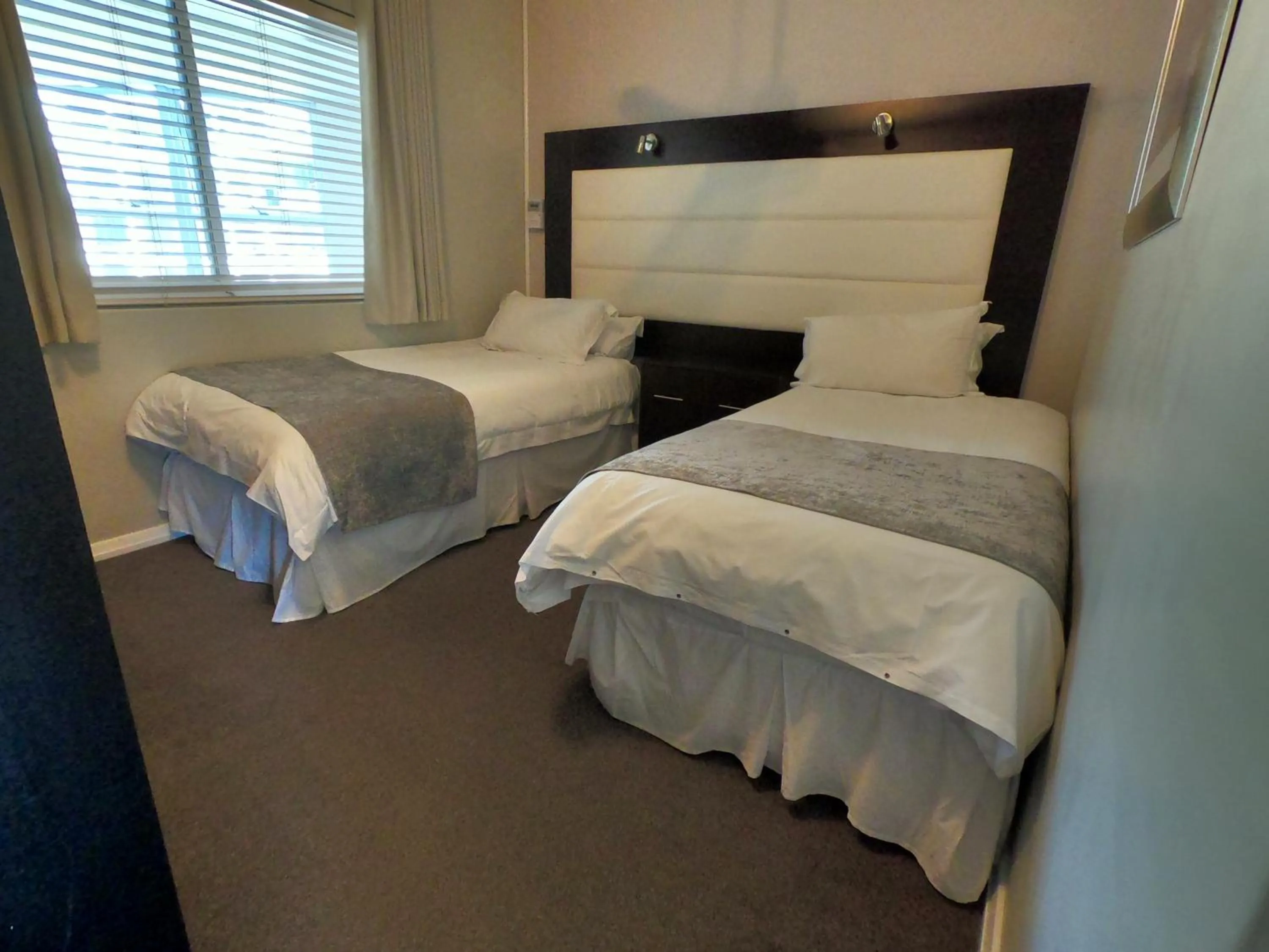 Bed in Lagoon Beach Hotel Apartments