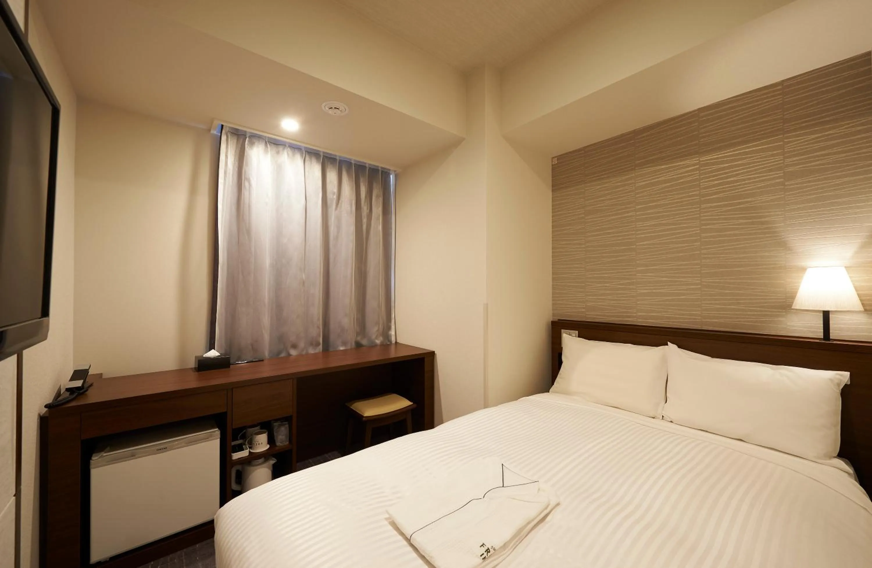 Bed in Sotetsu Fresa Inn Tokyo Roppongi