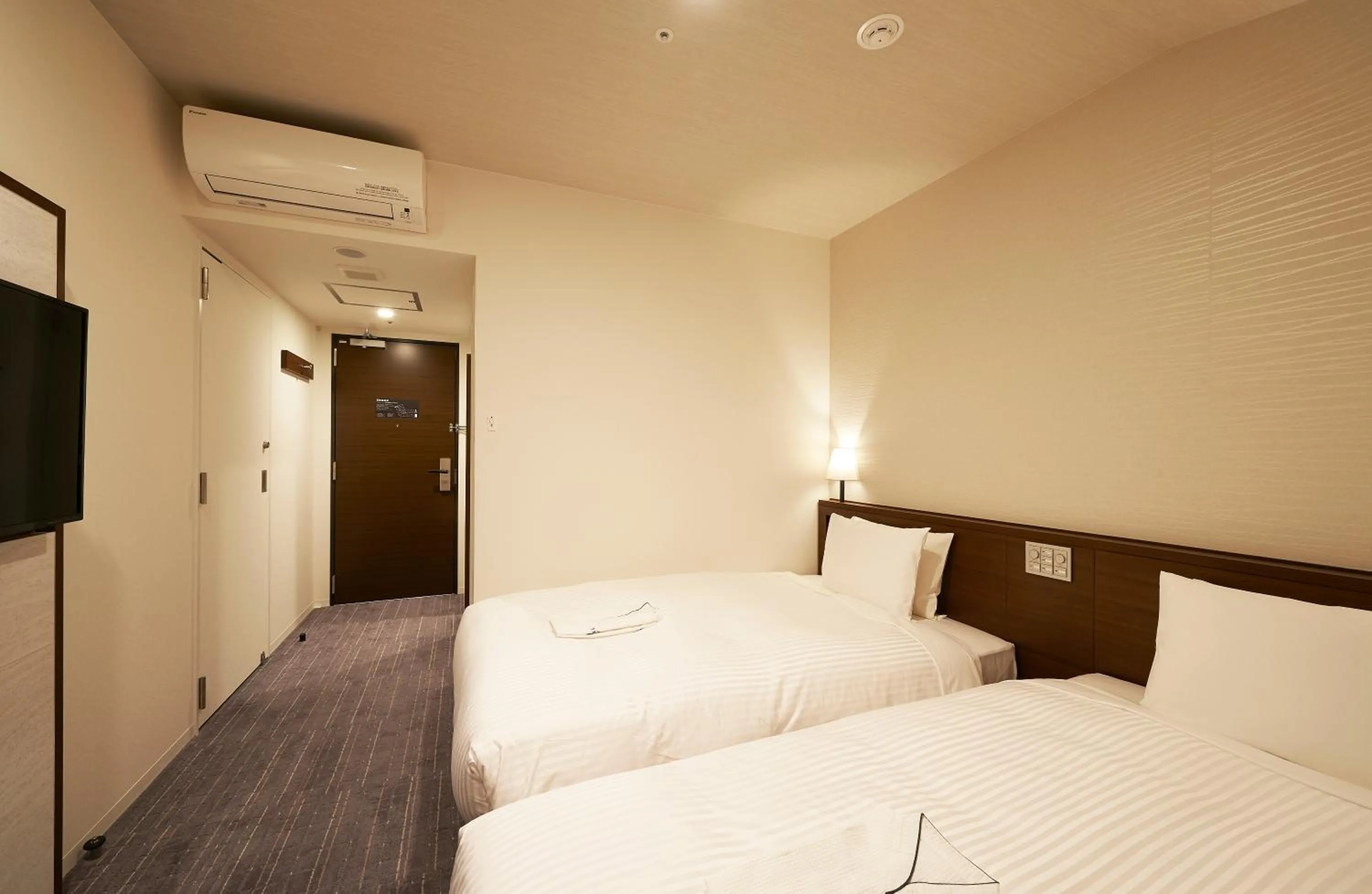 Bed in Sotetsu Fresa Inn Tokyo Roppongi