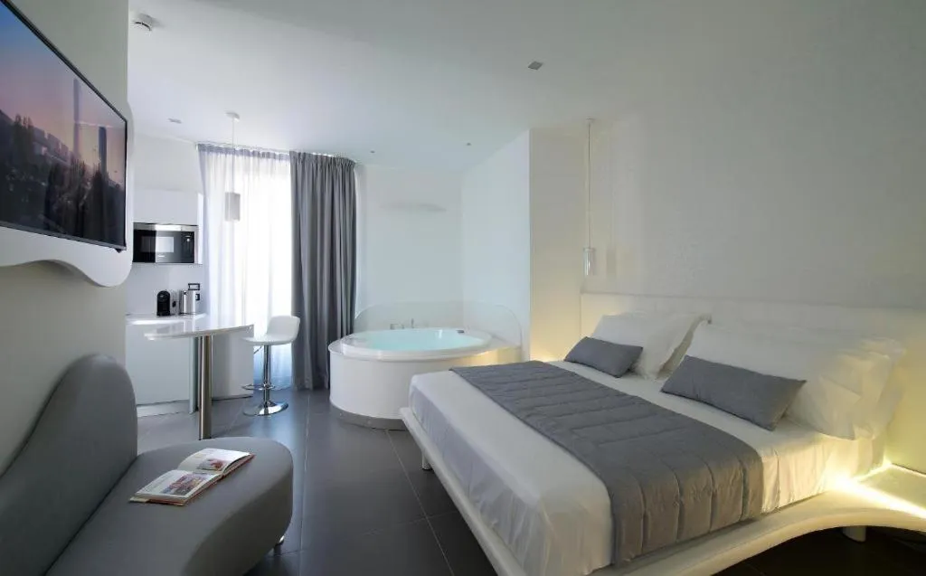 Bed in Gatto Bianco Mia Aparthotel