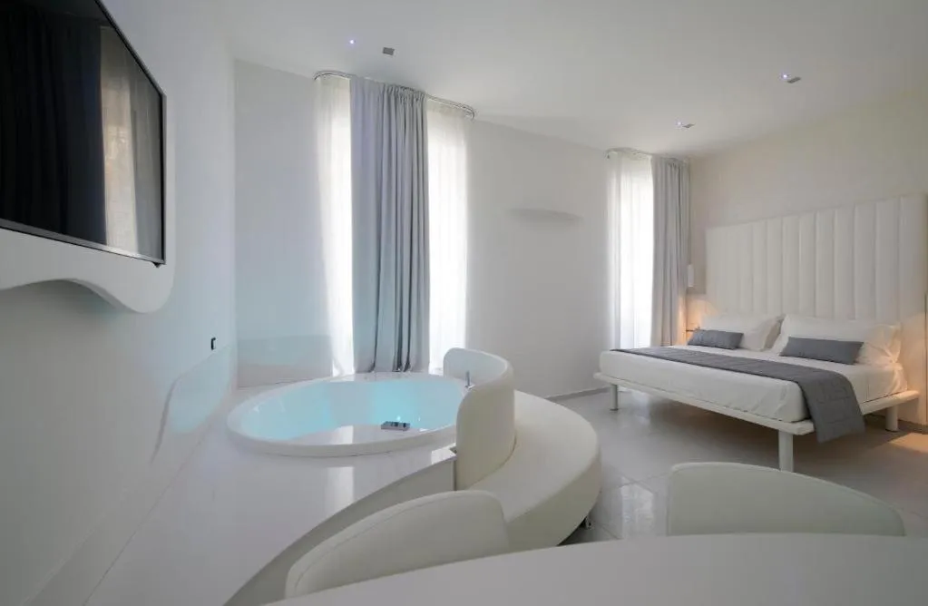 Bed in Gatto Bianco Mia Aparthotel