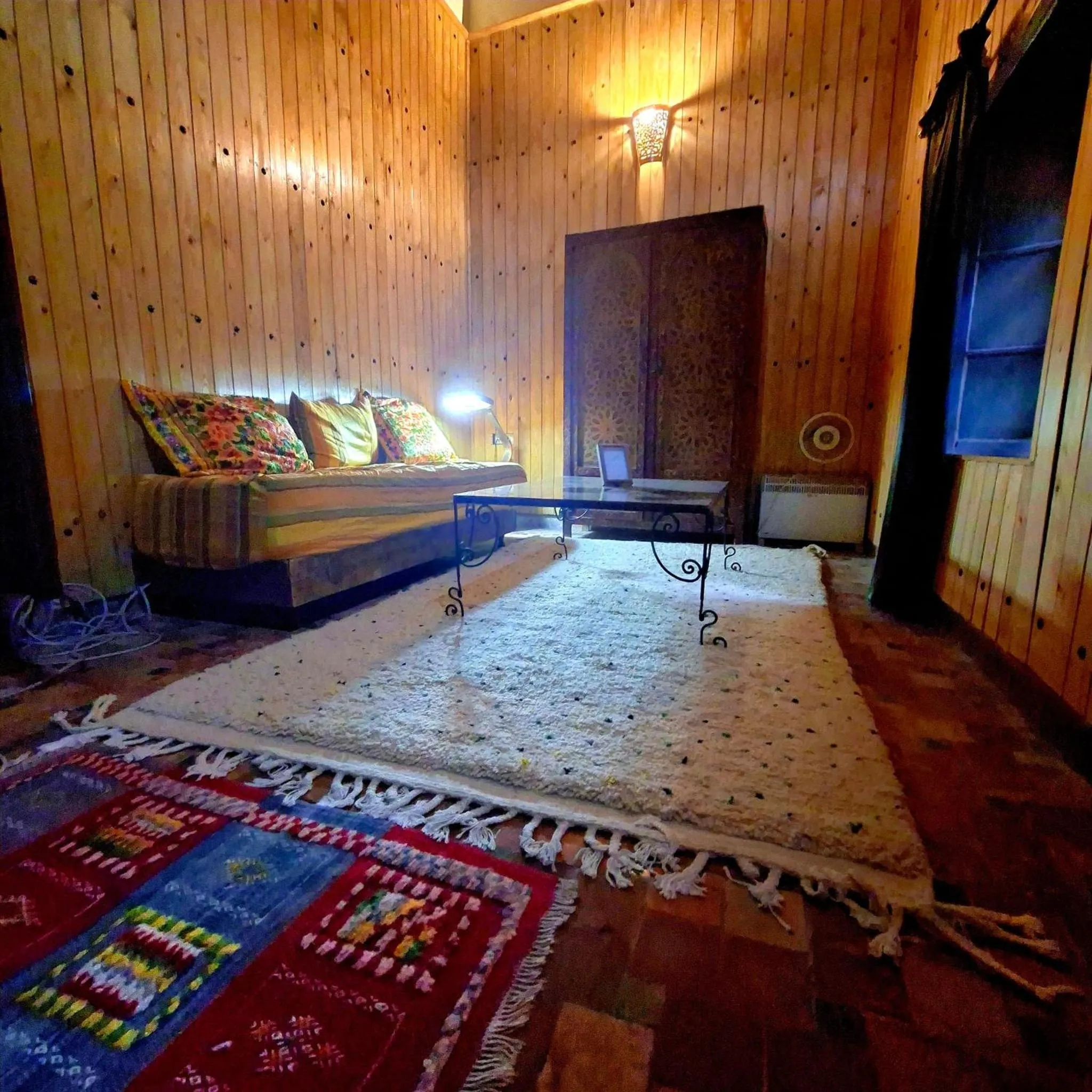 Living room, Bed in Riad Menthe Et Citron