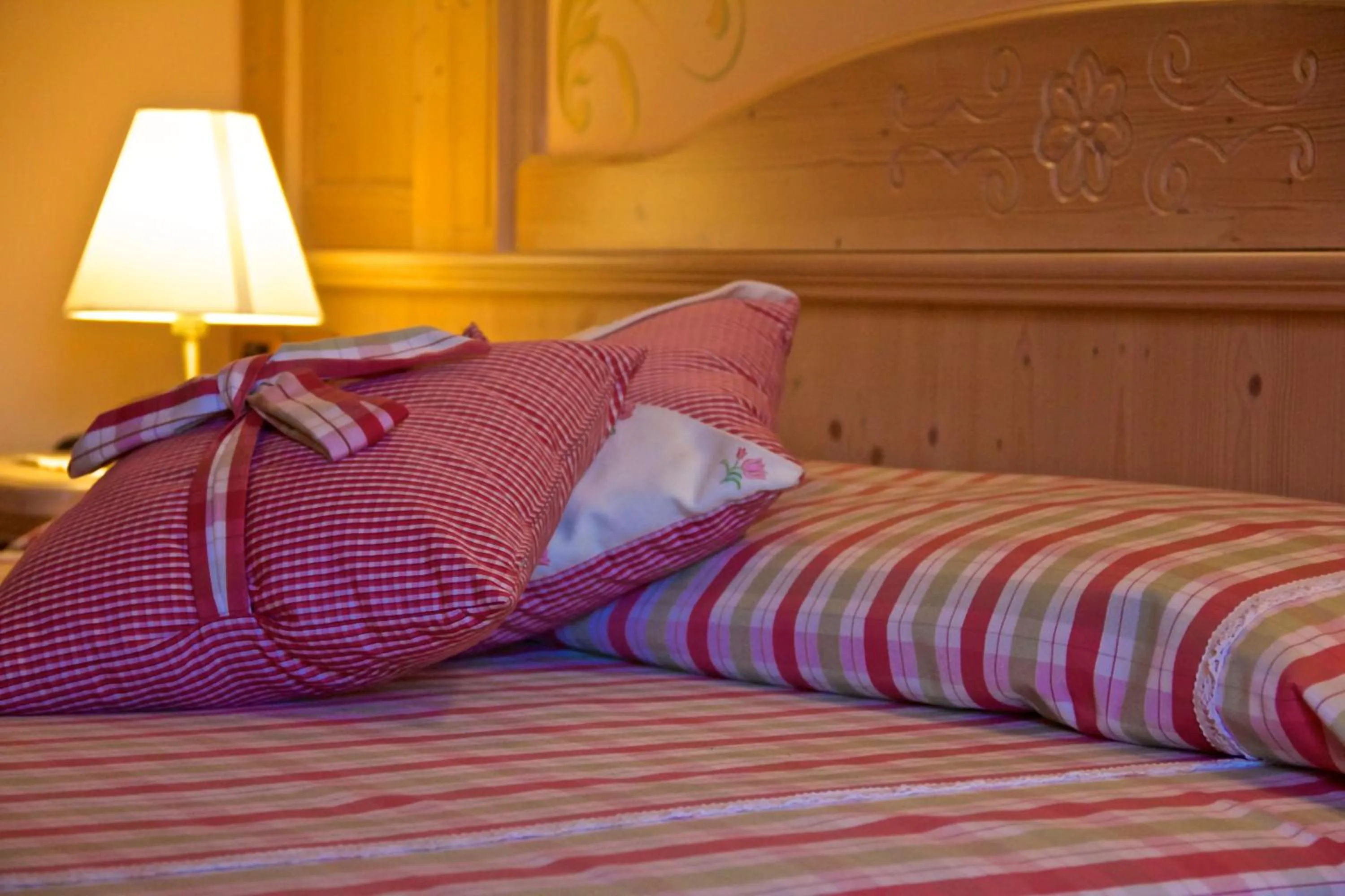 Decorative detail, Bed in Hotel Cima Rosetta - BW Signature Collection