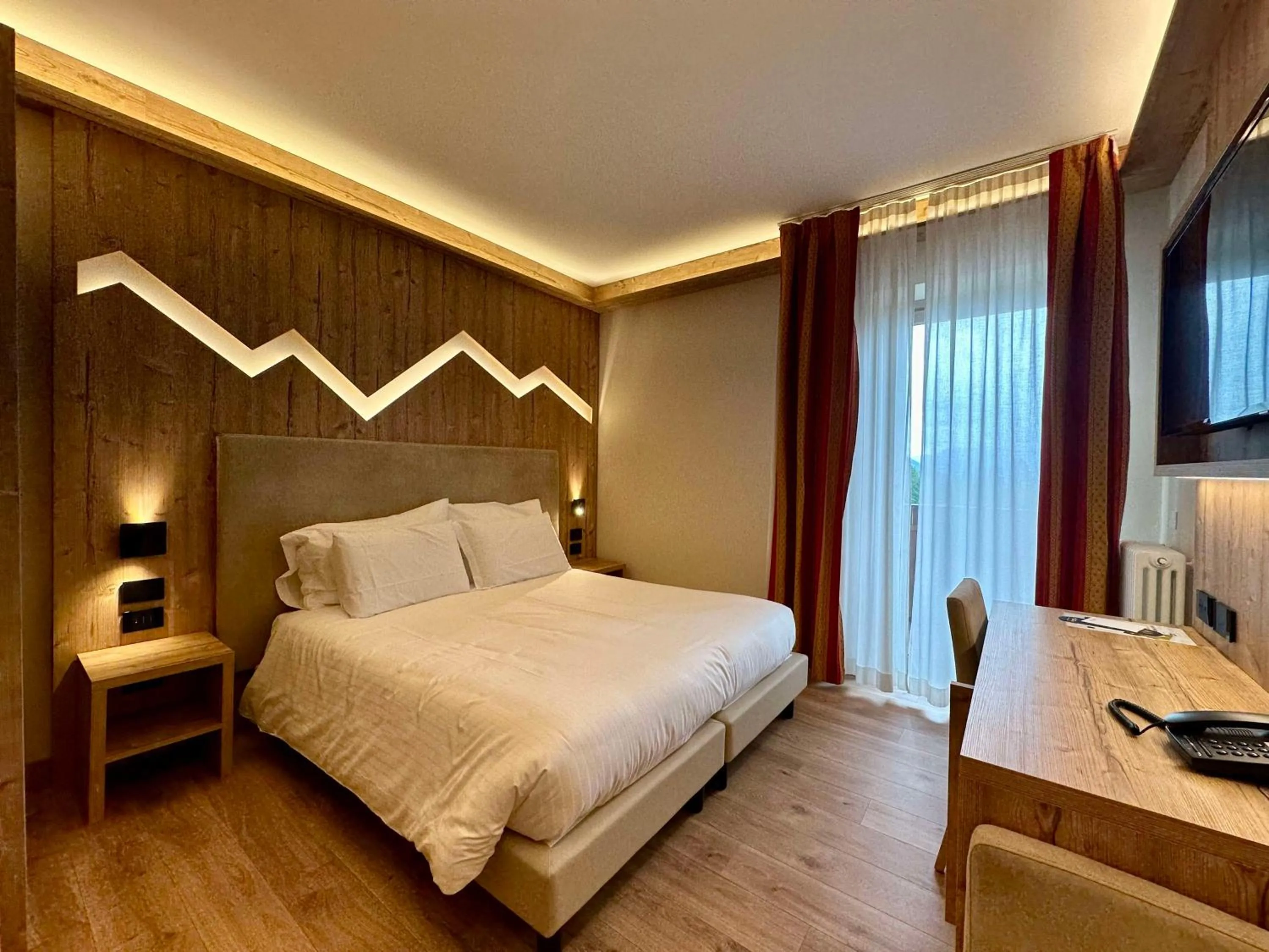 Bedroom, Bed in Hotel Cima Rosetta - BW Signature Collection