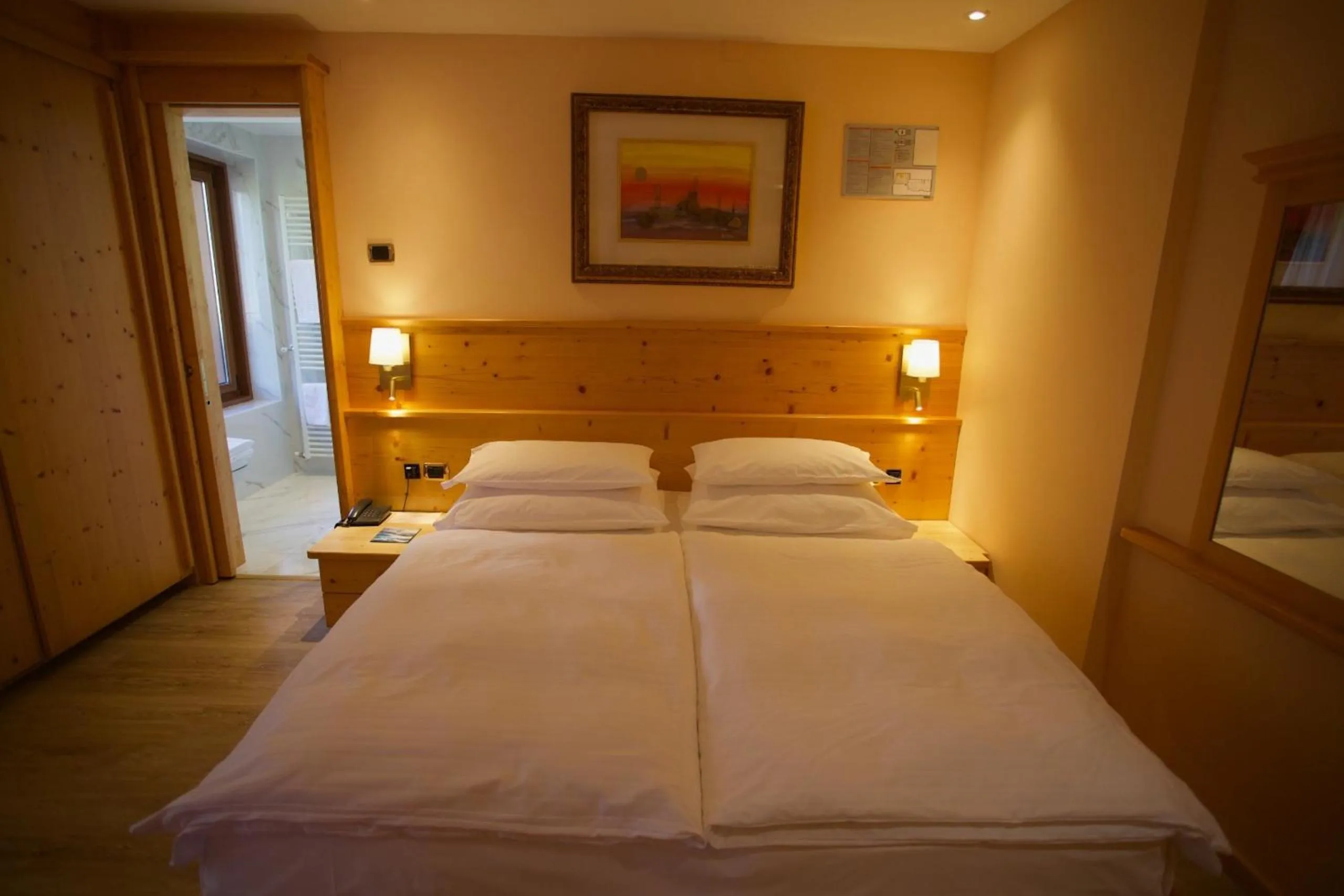 Bed in Hotel Cima Rosetta - BW Signature Collection