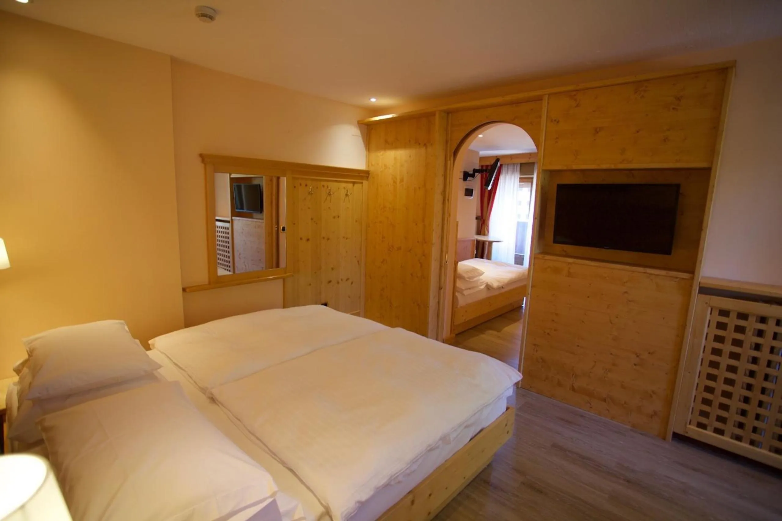 Bed in Hotel Cima Rosetta - BW Signature Collection