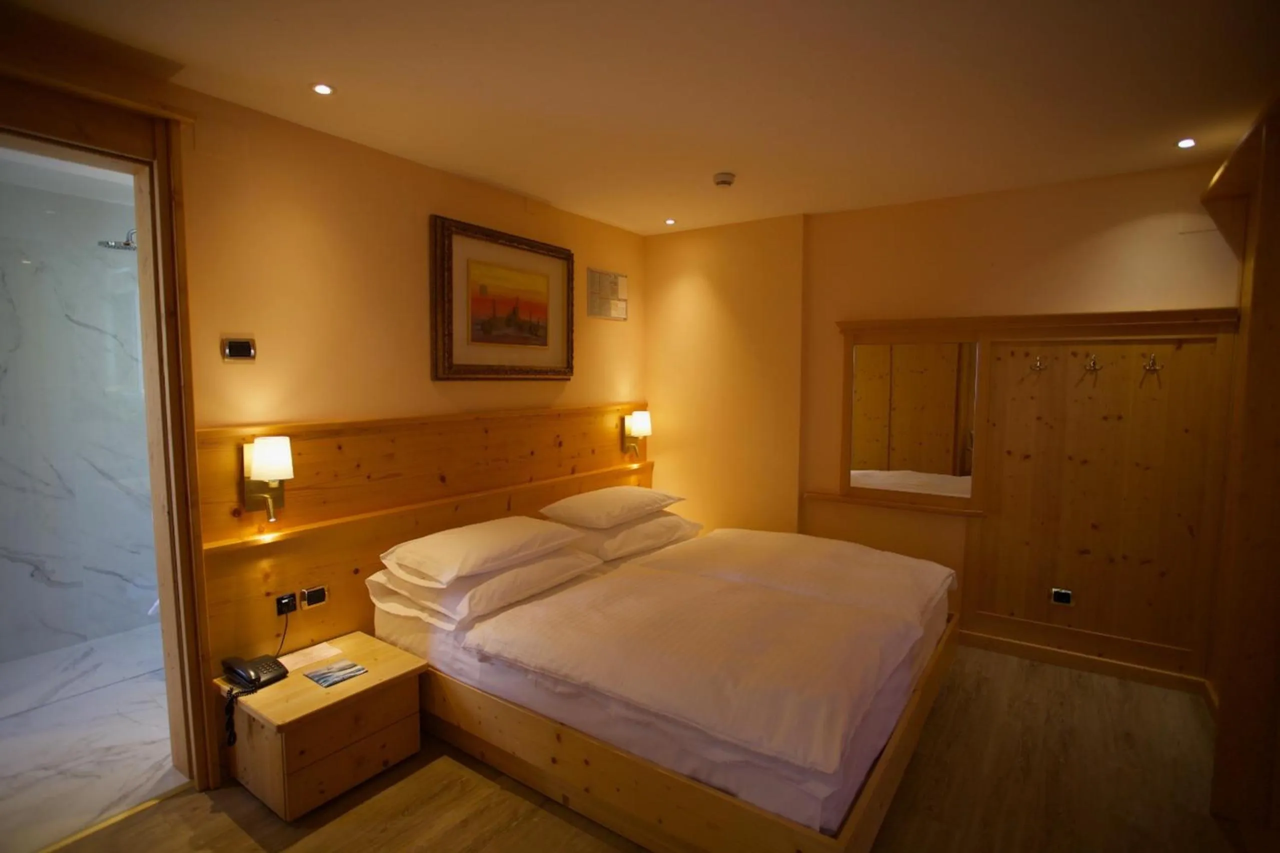 Photo of the whole room, Bed in Hotel Cima Rosetta - BW Signature Collection