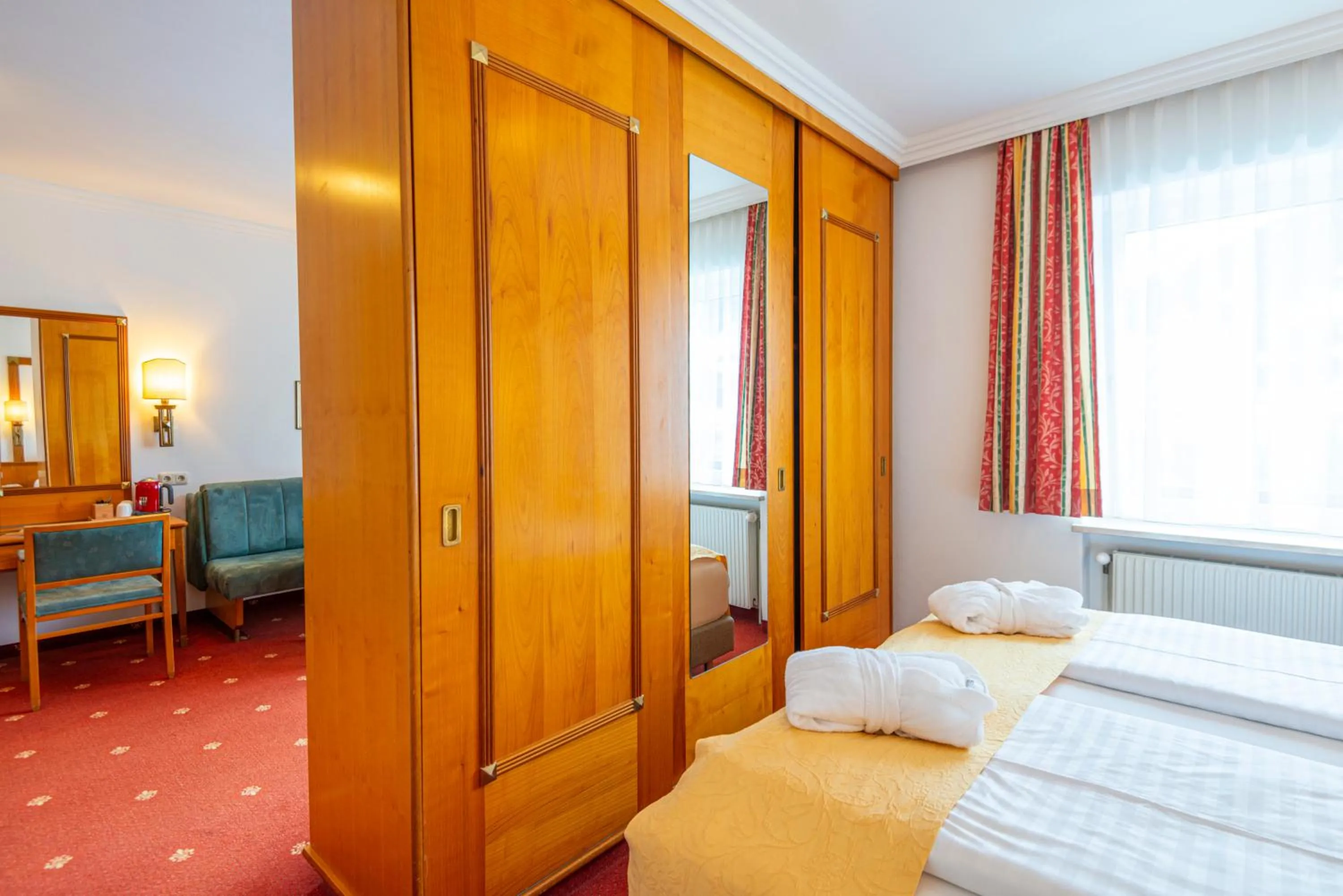 Photo of the whole room, Bed in Hotel Germania Gastein - ganzjährig inklusive Alpentherme Gastein & Sommersaison inklusive Gasteiner Bergbahnen