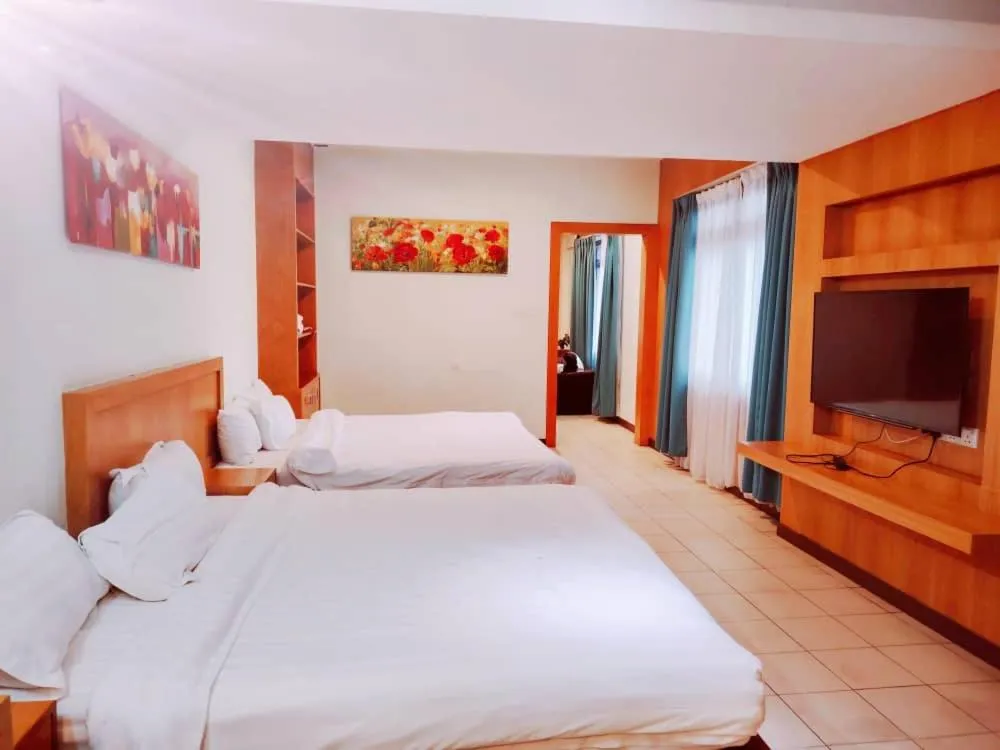 Bed in Fratini's Hotel Labuan