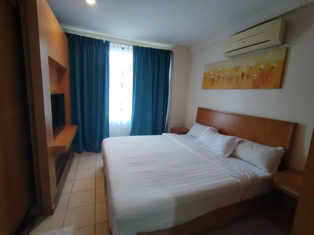 Bed in Fratini's Hotel Labuan