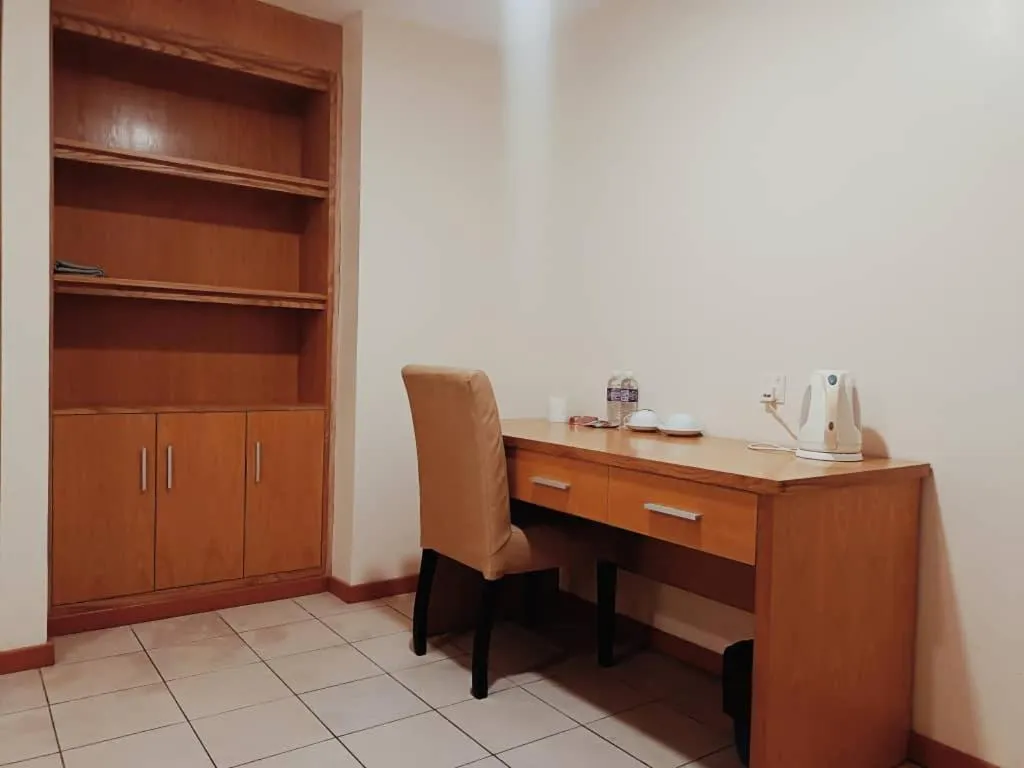 Bed in Fratini's Hotel Labuan