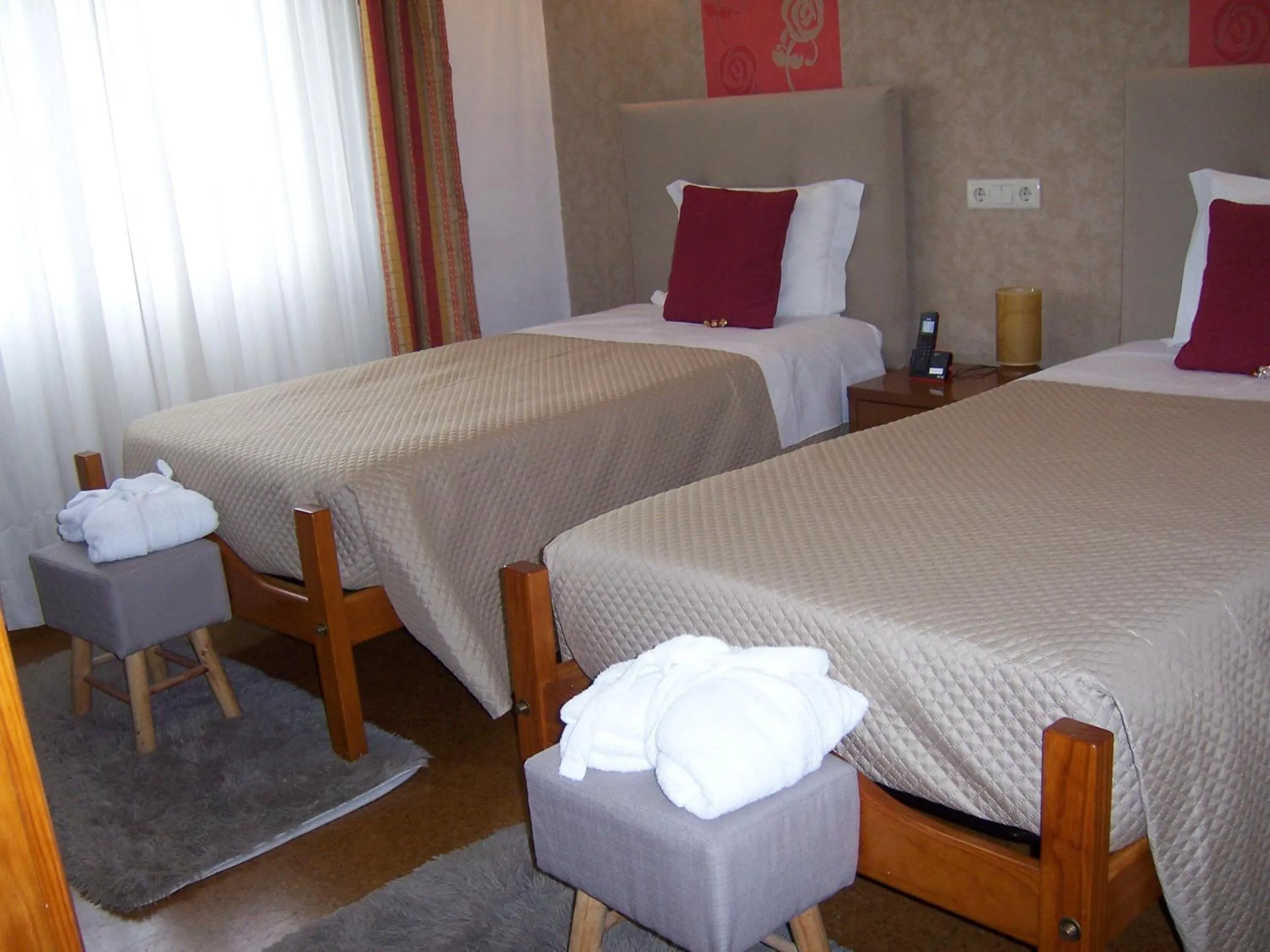 Property building, Bed in Hotel Santa Apolonia