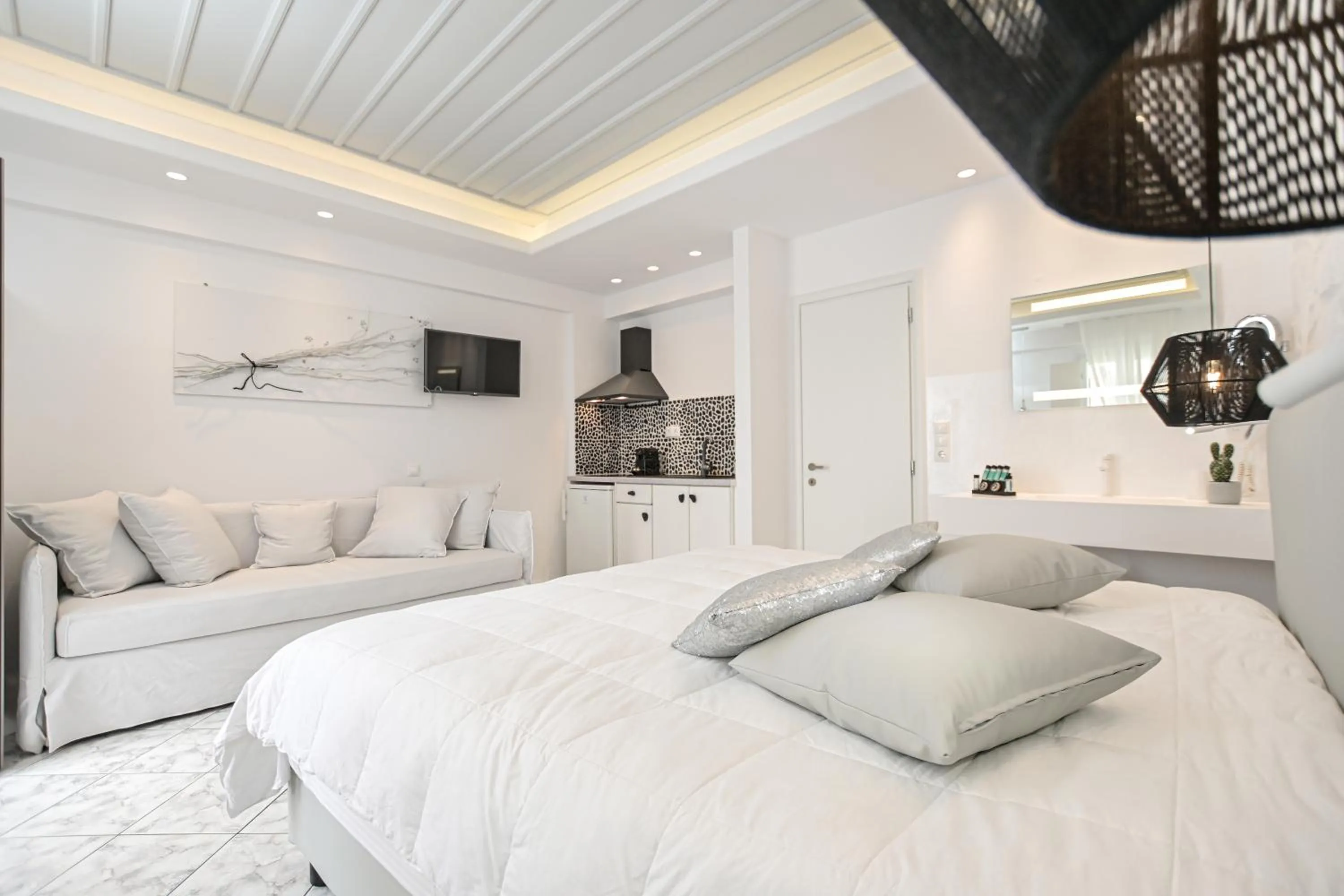 Bed in Naxos Evilion Luxury Apartments & Suites