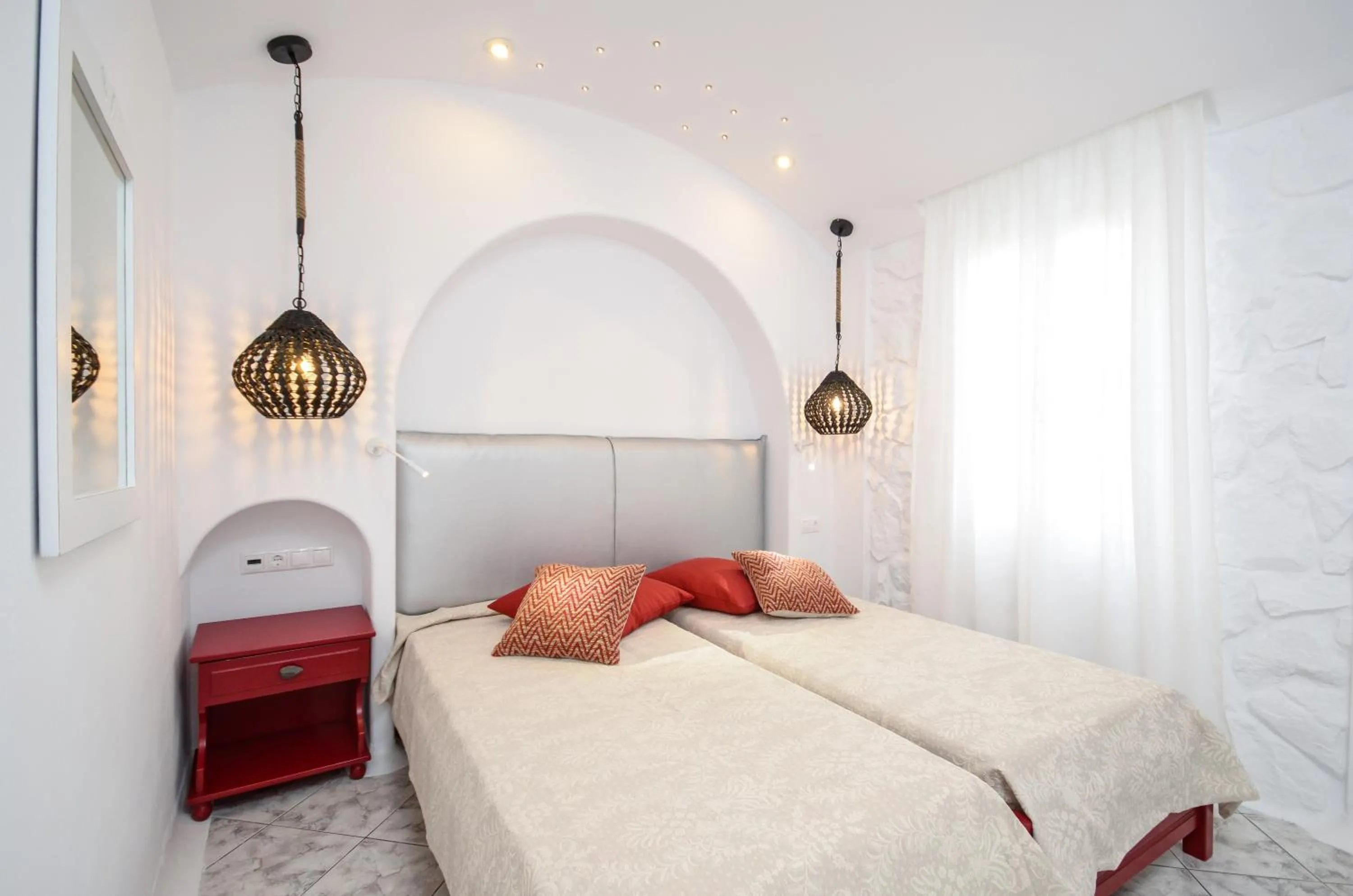Photo of the whole room, Bed in Naxos Evilion Luxury Apartments & Suites