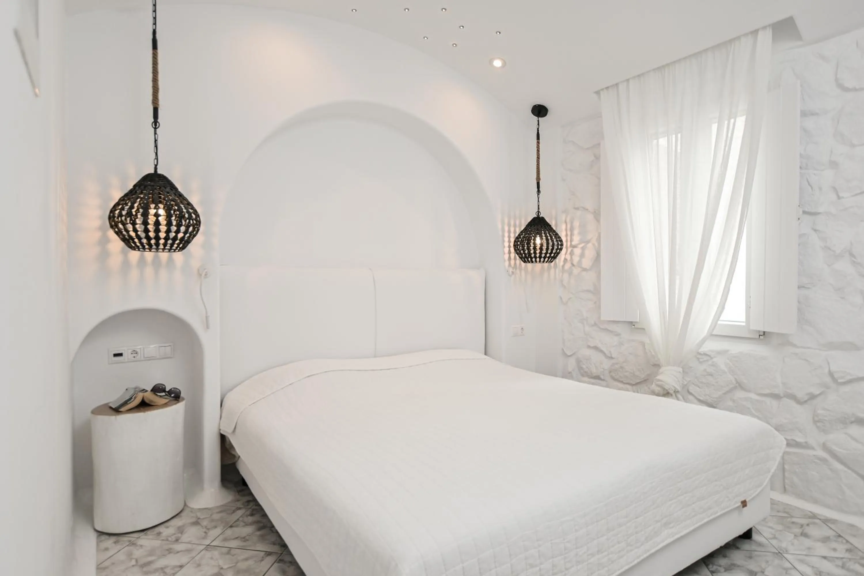 Bed in Naxos Evilion Luxury Apartments & Suites