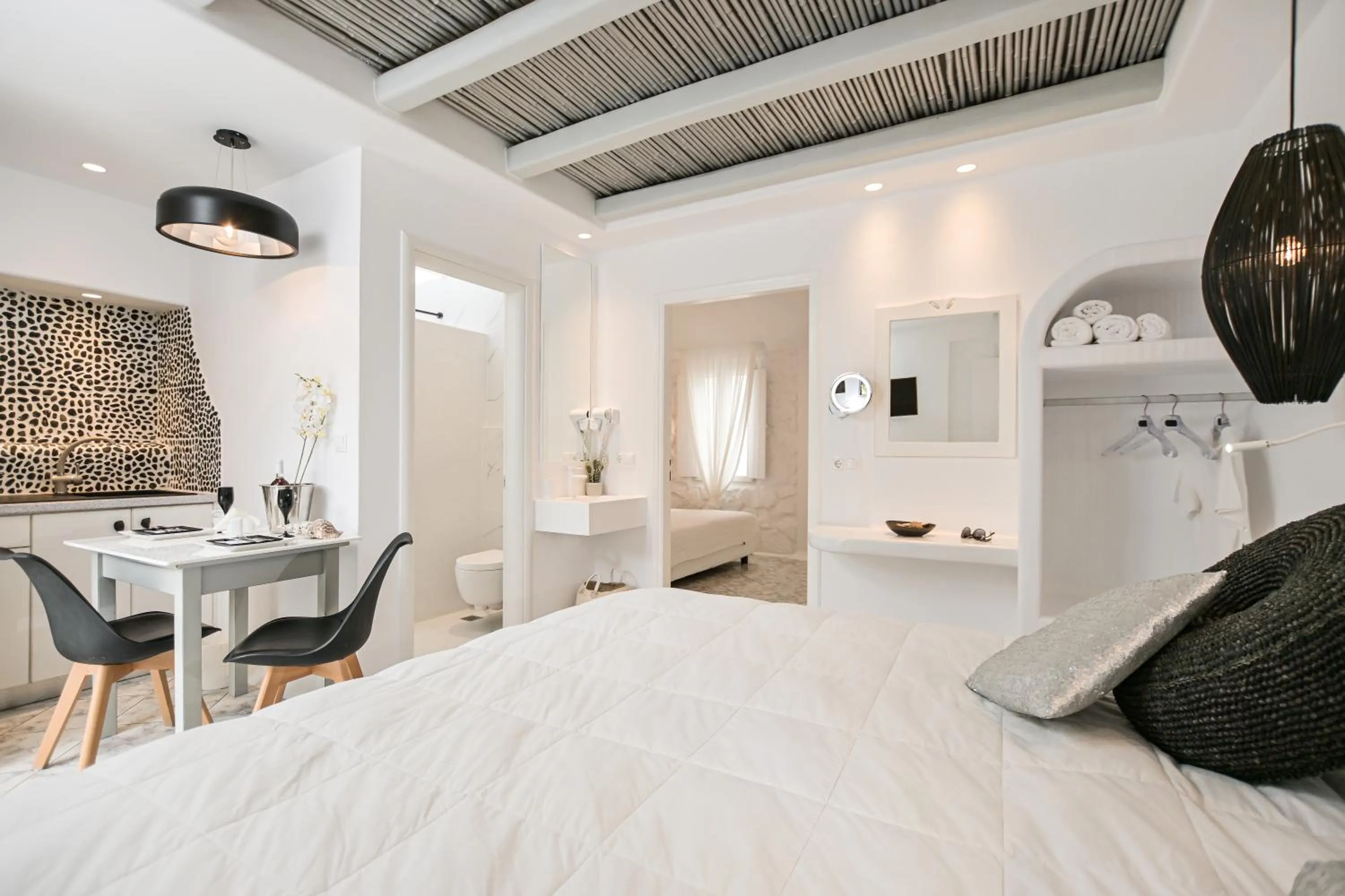 Bed in Naxos Evilion Luxury Apartments & Suites