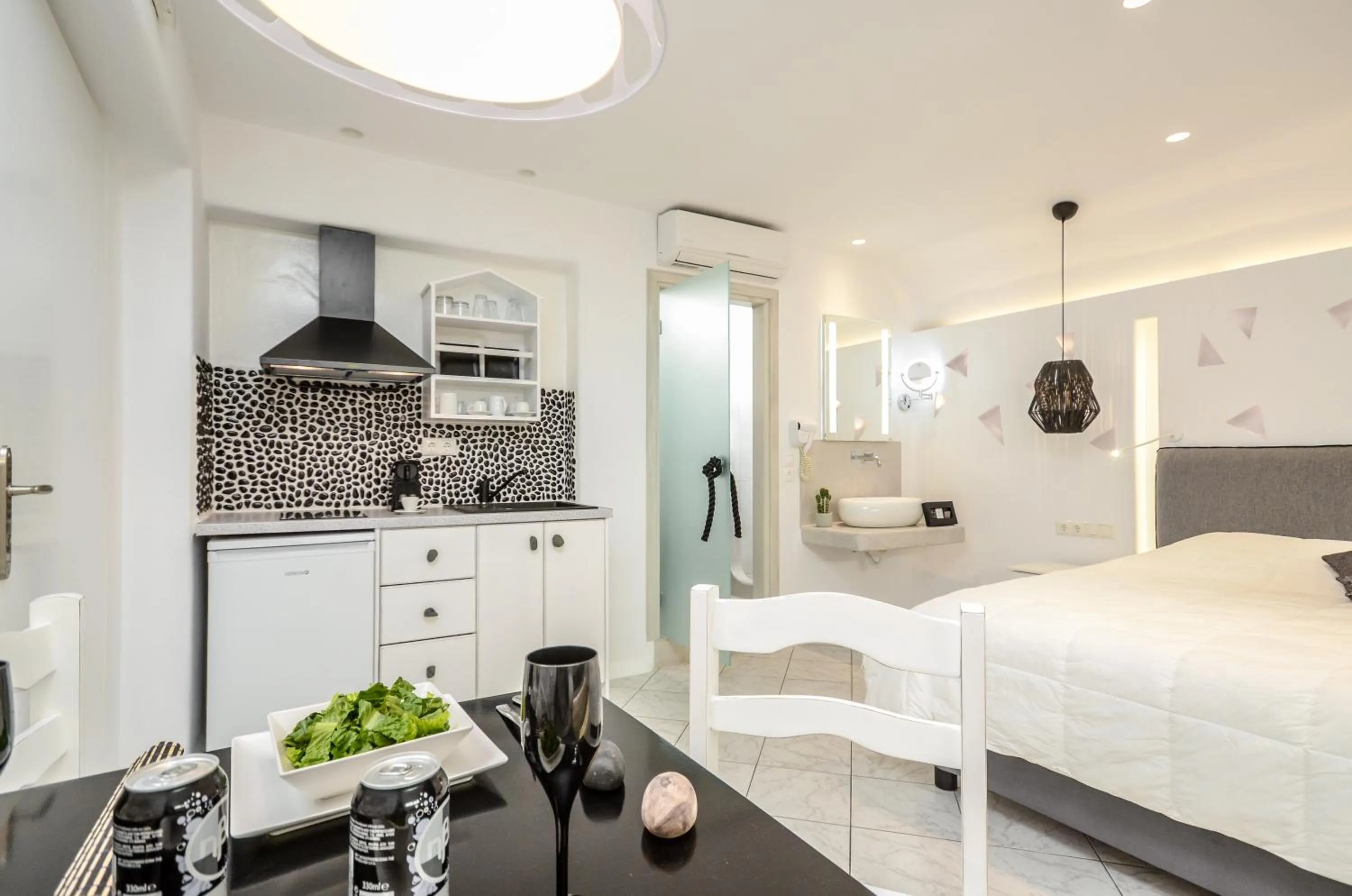 Bed in Naxos Evilion Luxury Apartments & Suites