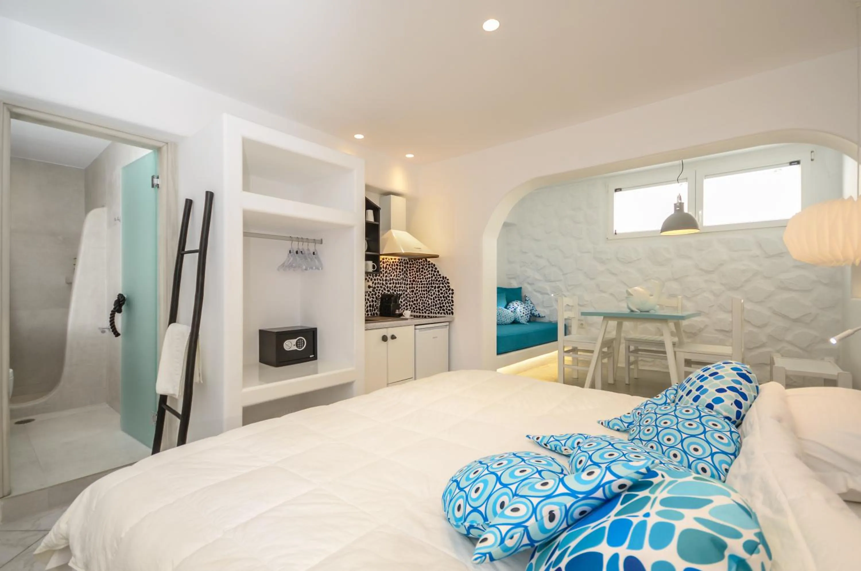 Bed in Naxos Evilion Luxury Apartments & Suites