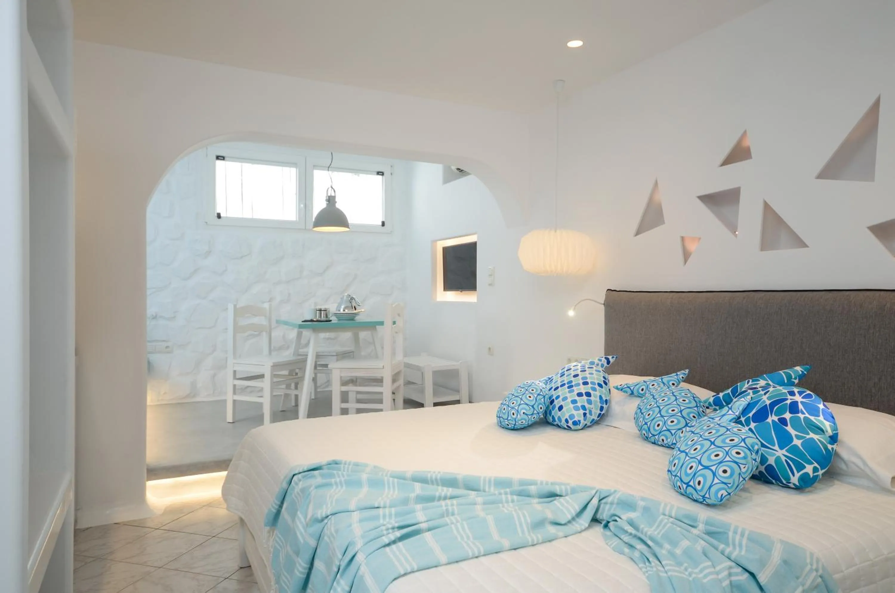 Photo of the whole room, Bed in Naxos Evilion Luxury Apartments & Suites