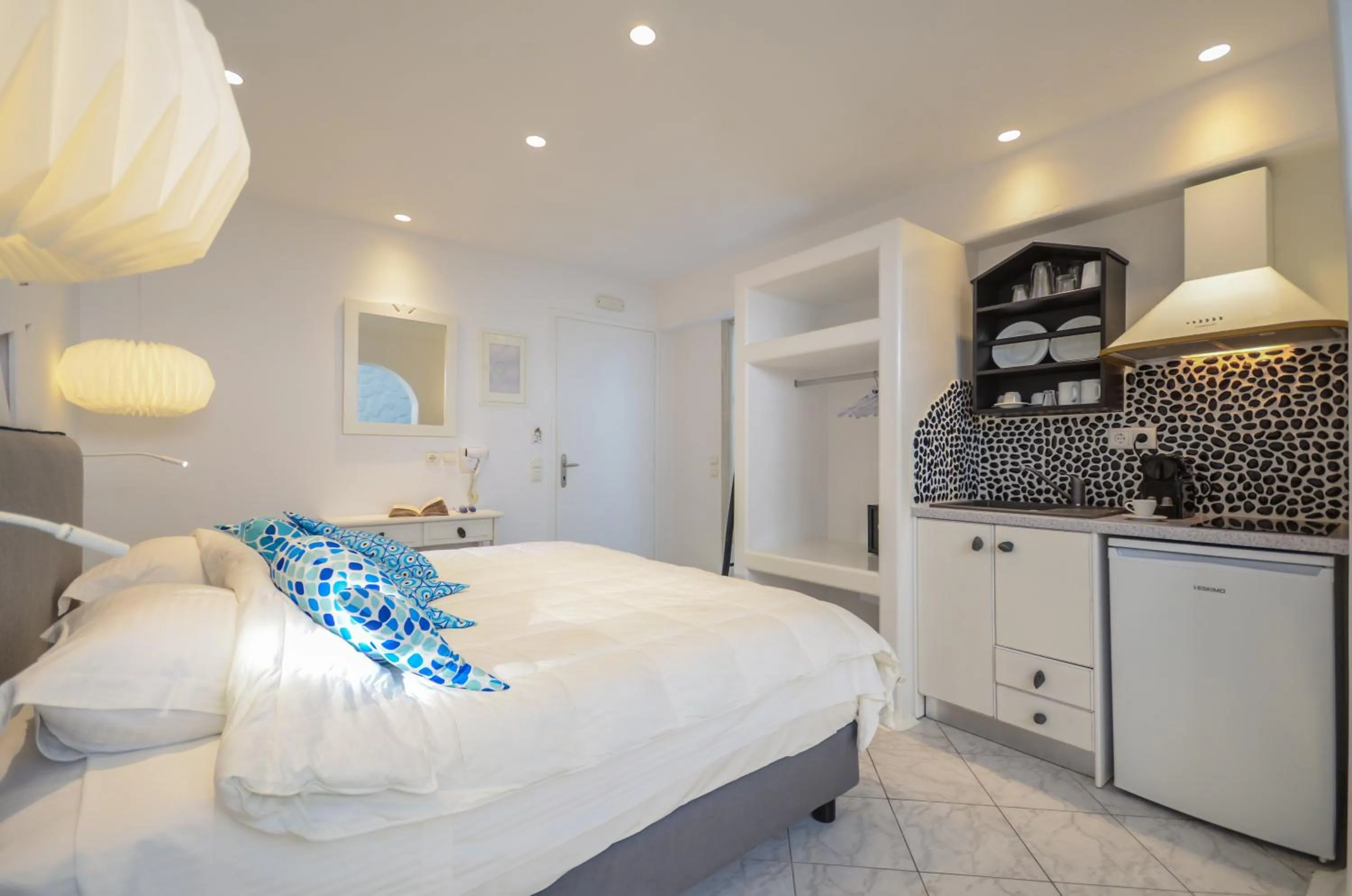 Bed in Naxos Evilion Luxury Apartments & Suites