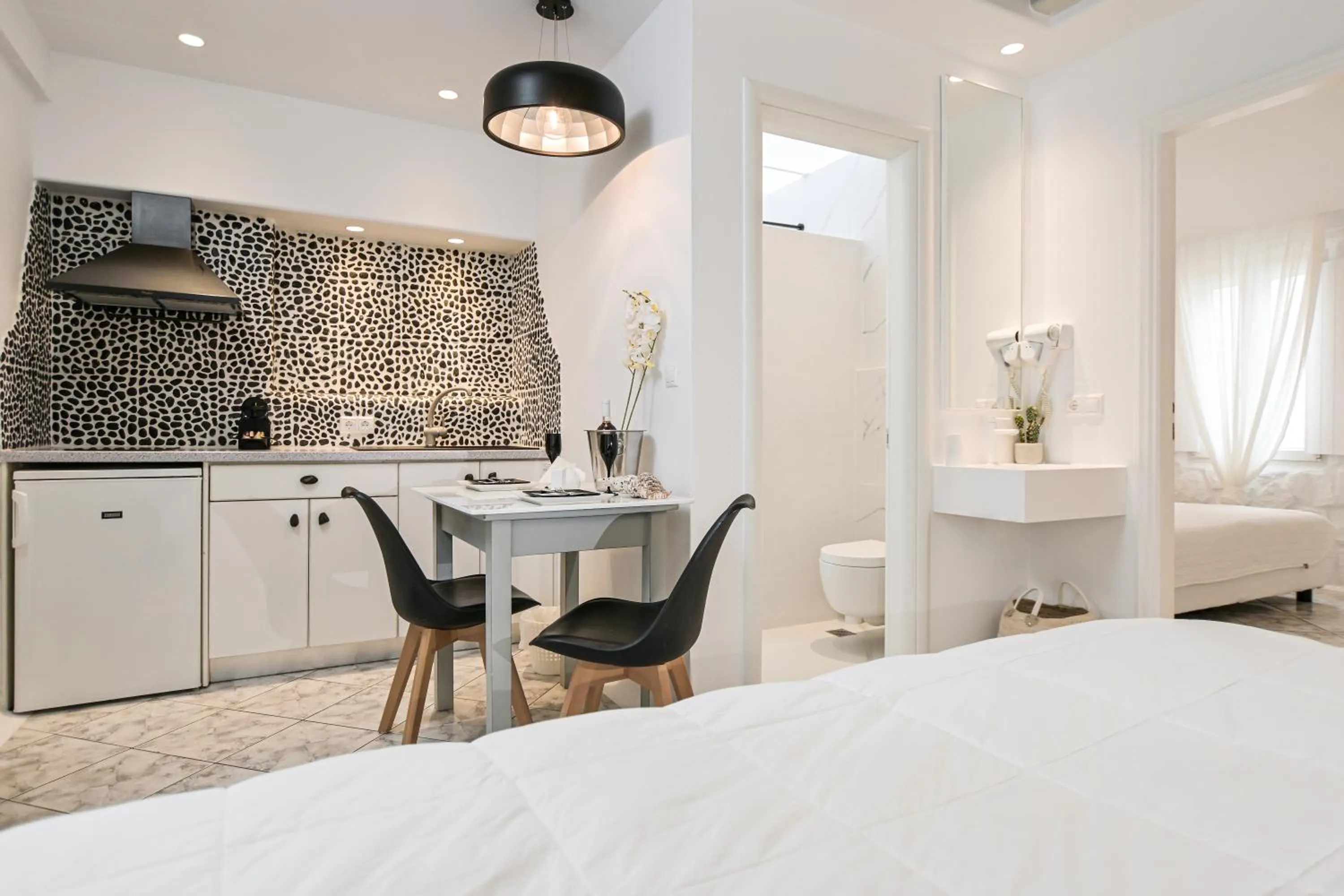 Bed in Naxos Evilion Luxury Apartments & Suites