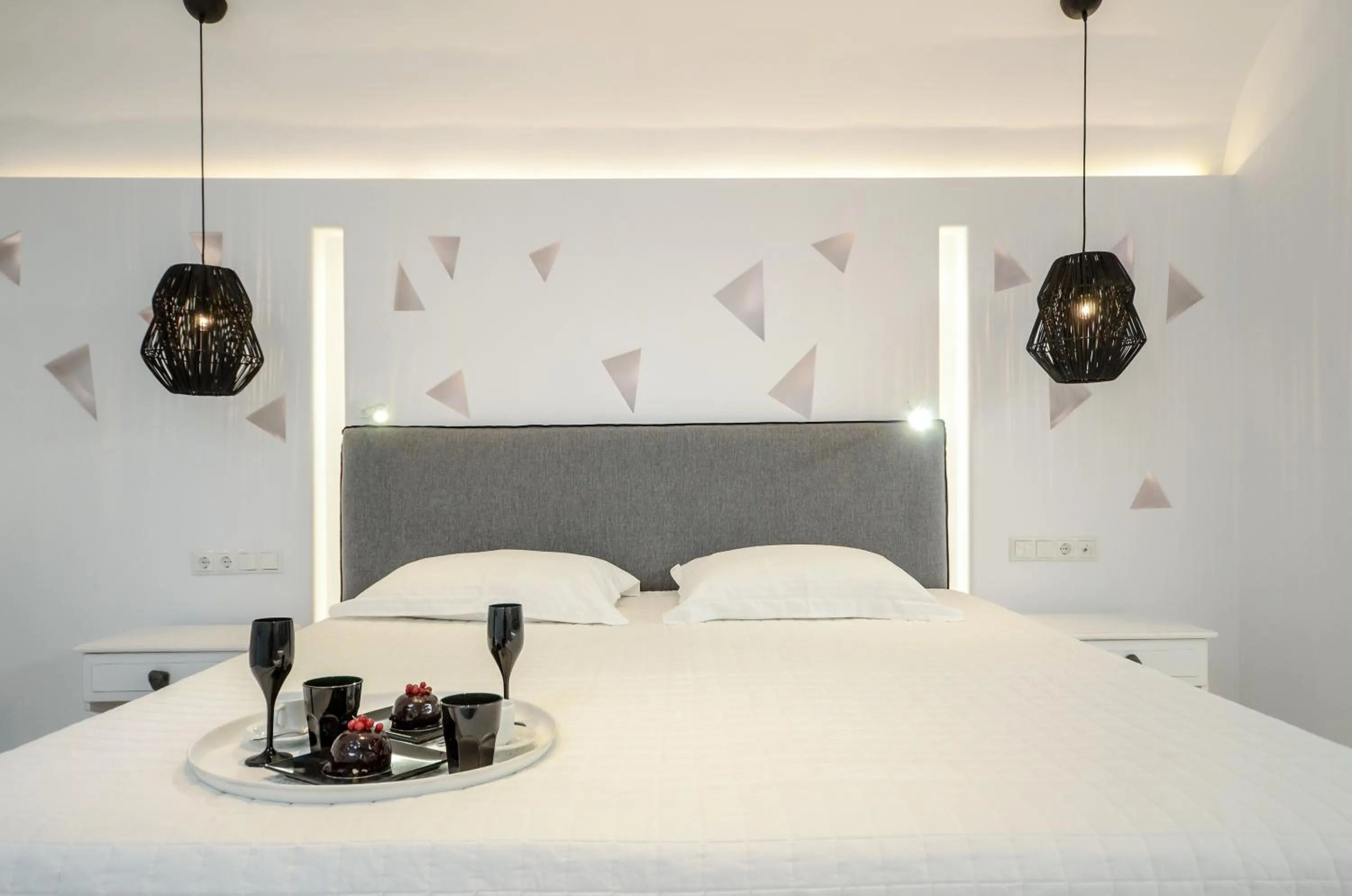 Decorative detail, Bed in Naxos Evilion Luxury Apartments & Suites