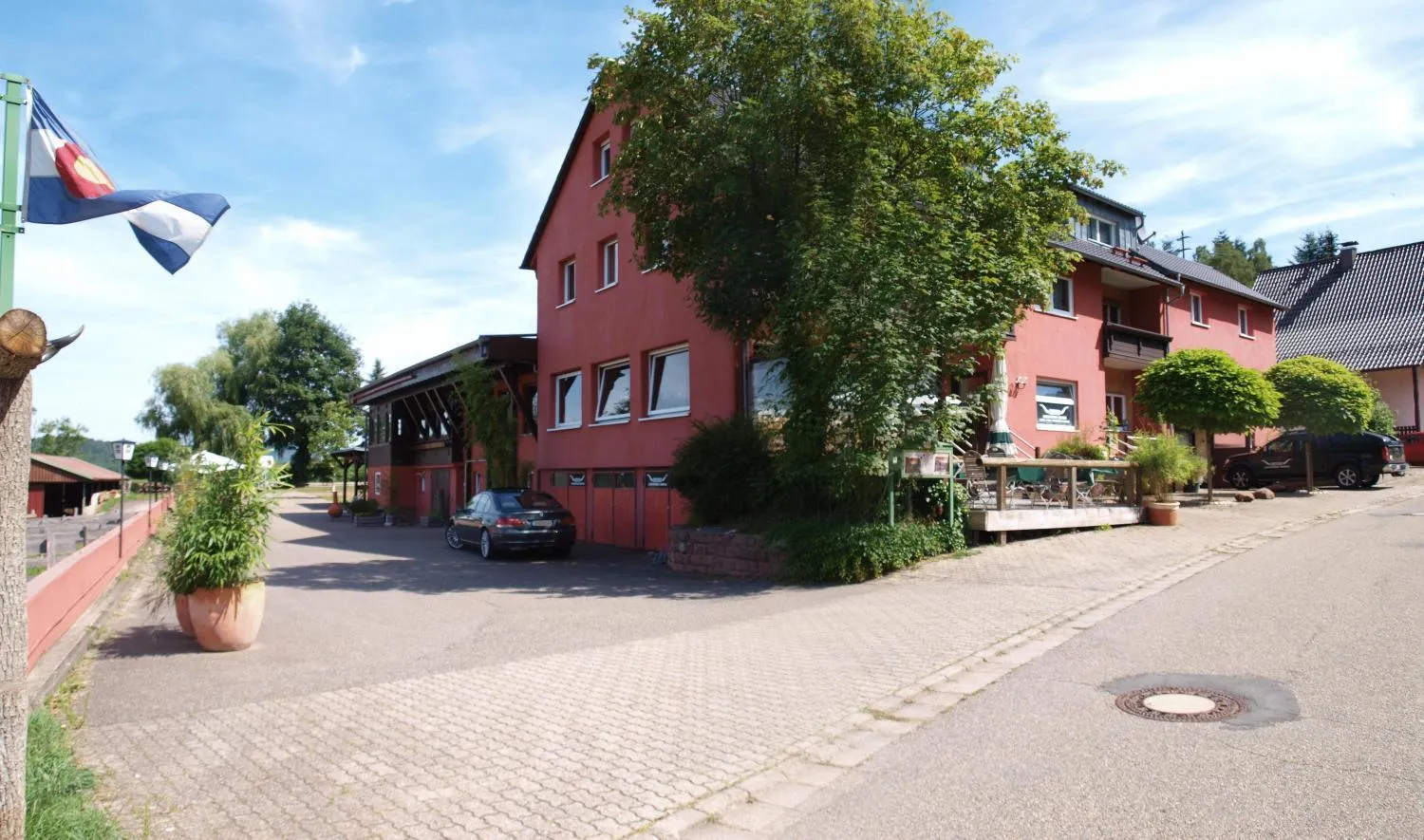 Property building in Longhorn Ranch Countryhotel - Garni